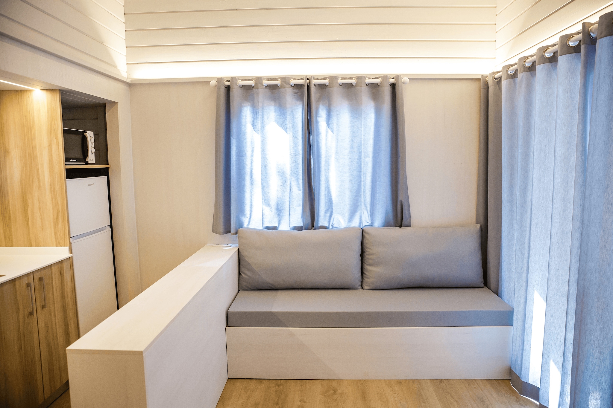 Charming Bungalow Under the Pines
Tucked away on a peaceful, family-friendly campsite, this cozy bungalow offers a restful retreat beneath the dappled shade of towering trees. Perfect for families or small groups, it features a double bedroom on the ground floor and a charming loft space with additional sleeping arrangements. The open-plan living room and fully equipped kitchen (with ceramic cooker, coffee machine, microwave, and fridge) make it easy to enjoy homemade meals. Step outside onto your private terrace with garden furniture and relax under the Mediterranean sun.

Beachside Bliss & Pet-Friendly Adventures
Located just a short stroll from the golden beaches of Cambrils, you and your furry companion will find plenty of space to roam. Pets are welcome, and nearby Platja de lâ€™Esquirol is known for its pet-friendly vibe. Explore coastal trails, enjoy seaside picnics, or visit nearby parks with pet agility zones. The on-site shared swimming pool (open from April 17th) is perfect for cooling off after a day of sun-soaked fun.

Explore Cambrils & Local Flavors
The bustling center of Cambrils is only a kilometer away, where youâ€™ll find waterfront tapas bars, seafood restaurants, and charming boutiques. Stroll the marina, sample local wines, or take a pet-friendly boat tour along the Costa Dorada. Whether you're here to unwind, explore, or simply share a getaway with your four-legged friend, this bungalow is the perfect home base.