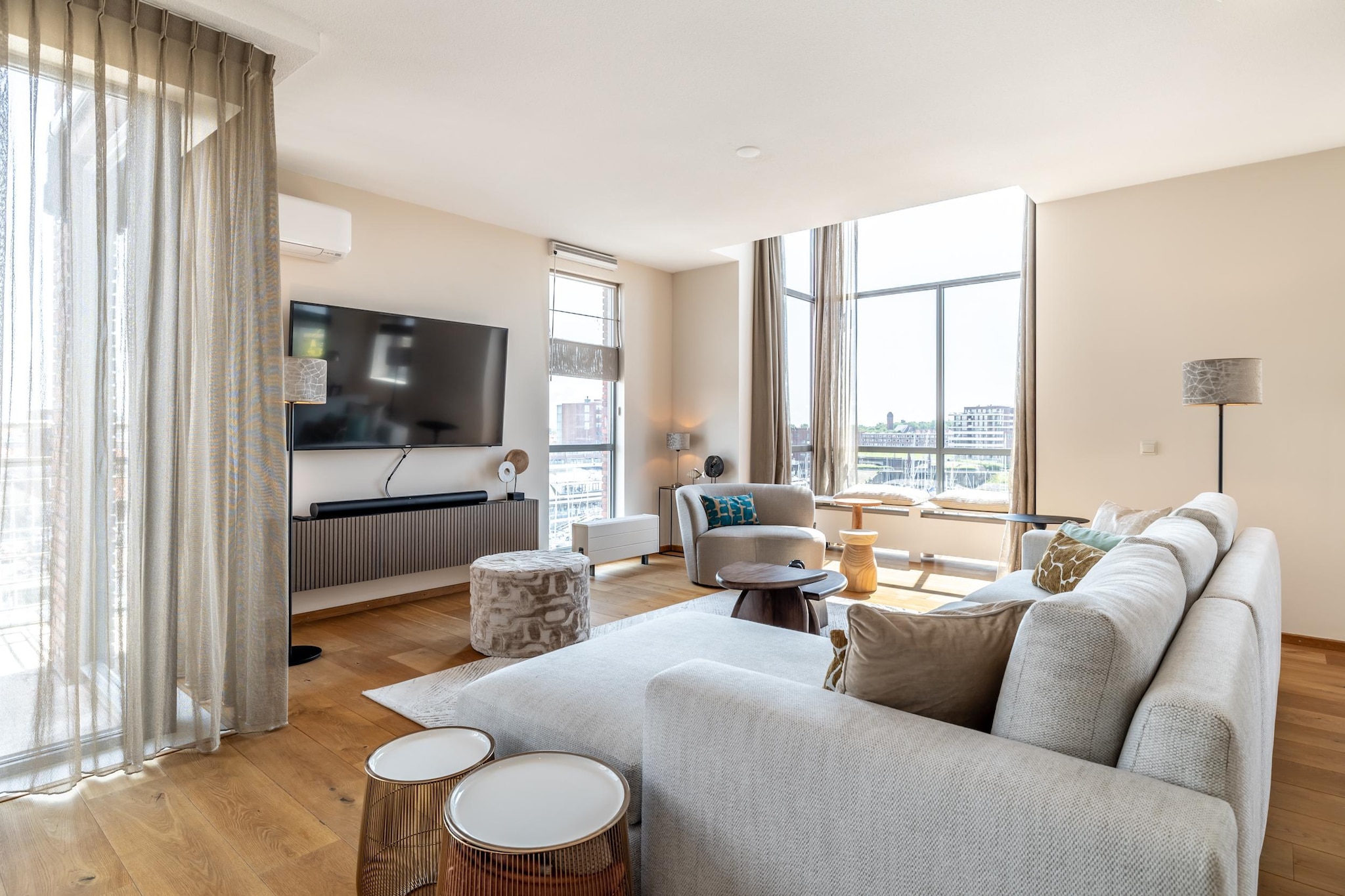 This luxurious 2 bedroom 160 m2 (!) penthouse apartment is part of the Nautical Center Scheveningen located at the second inner harbor of Europe's largest and fashionable bathing resort of Scheveningen, only 15 minutes away from the vibrant city center of The Hague with impressive hotspots like Madurodam and the Louwman Car Museum. Apartment no. 42a has a spacious 30 m2 terrace offering a stunning view on the exclusive seaworthy yachts. It includes a secured private parking from where you can take an elevator to the apartment entrance. The apartment itself has been beautifully designed and furnished to the highest standard. It offers essentials such as high speed internet, a large SMART TV, a fully equipped kitchen, a spacious bathroom, a separate toilet and laundry facilities. The comfortable boxspring beds guarantee a good night sleep. Within walking distance you find South beach, some of the best restaurants, a supermarket and the 'world famous' local fish shop Simonis, known for the best fresh fish in town. Holland's most famous seaside resort Scheveningen has an abundance of attractions and beach pavilions. So take a stroll along the boulevard to the famous pier with its new ferris wheel and put on your dancing shoes after sunset to enjoy the best of The Hague's nightlife. Beach life and city life go together in The Hague which explains why so many people come back to this wonderful apartment every year again! 

Free private parking.