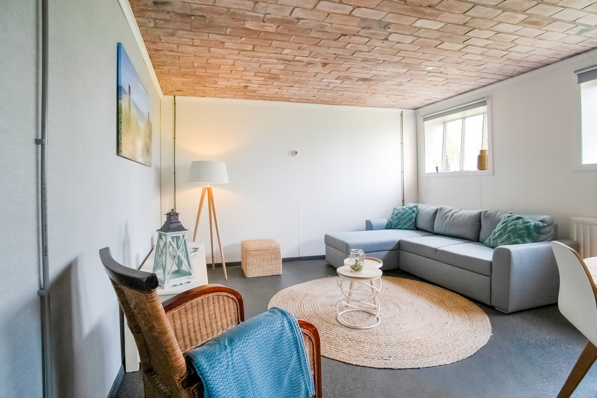 Ground floor: (Living room(double sofa bed, dining table), open kitchen(cooker, coffee machine, microwave, fridge), bedroom(single bed, single bed), bathroom(shower, washbasin, toilet))\n\nwashing machine, heating, terrace(shared with other guests), garden, parking