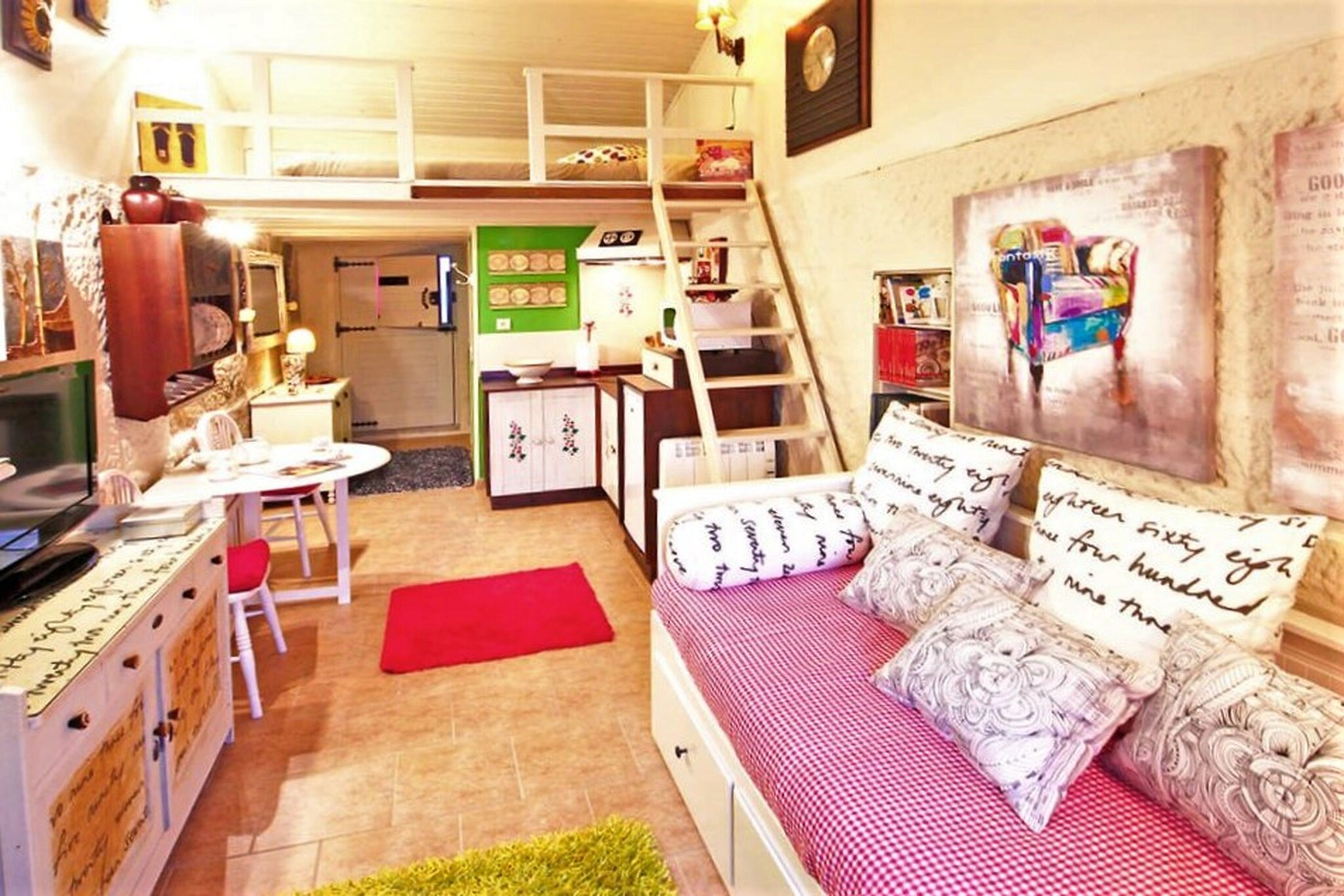 Ground floor: (Entrance(reachable from the outside), open kitchen(hob(2 ring stoves, electric), toaster, coffee machine(cups), microwave, fridge, Juicer), Living/bed room(TV(flatscreen, smart TV), dining table, seating area), bathroom(shower, washbasin, toilet), relaxation area(single bed(90 x 200 cm), single bed(90 x 200 cm)), balcony or terrace, heating)\n\nAnnex: (bedroom(via fairly steep stairs)(double bed(150 x 200 cm)), heating)\n\nparking, ironing board, iron