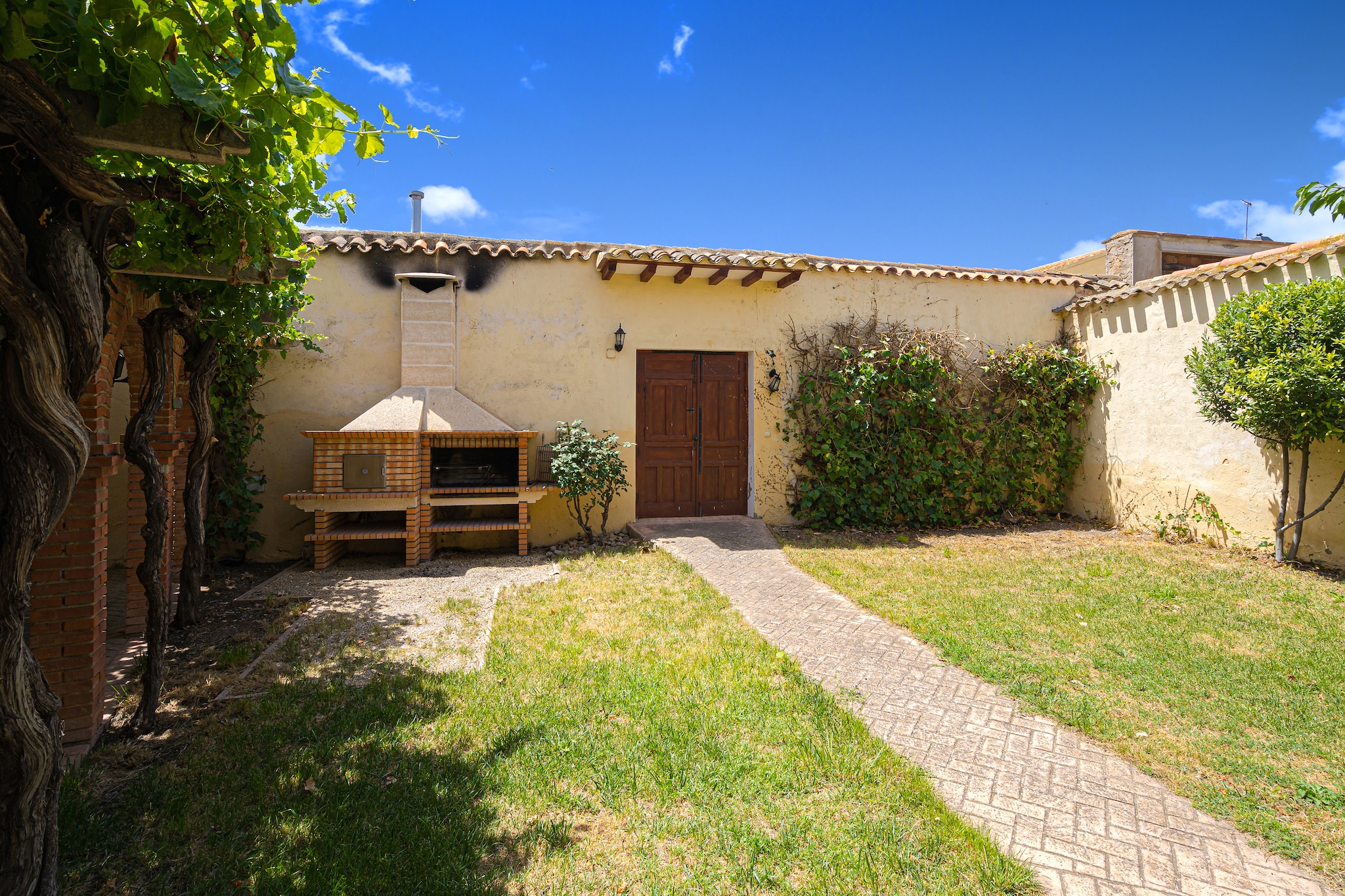 La Casa de Andújar - Tuinen zomer