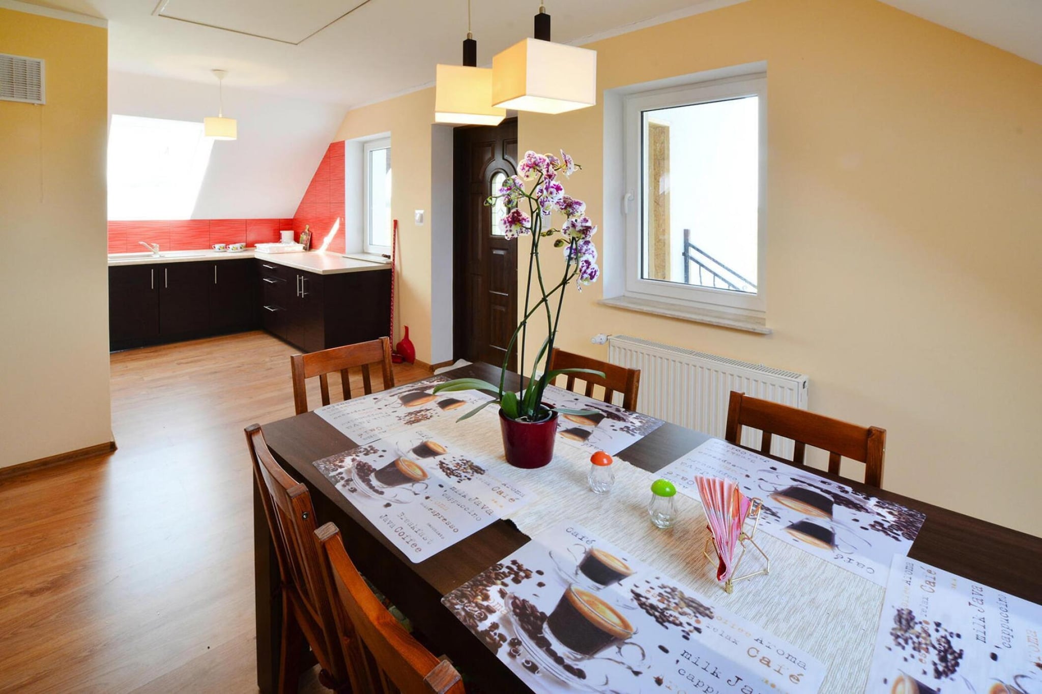 Attic: (open kitchen(hob(4 ring stoves, induction), electric kettle, coffee machine, microwave, dishwasher, fridge-freezer), Living/diningroom(dining table(6 persons)), bedroom(double bed, TV(flatscreen, satellite, german television channels)), bedroom(single bed, single bed, TV(flatscreen, satellite, german television channels)), bathroom(shower, washbasin, toilet, washing machine, hairdryer), bathroom(shower, washbasin, toilet))\n\nBasketball, heating(central), garden(shared with the owner , fenced, 5000 m2), bicycle storage(shared with the owner ), garden furniture, sun loungers, BBQ(charcoal), parking, pond, parasol, table football, bicycles available(paid), high chair, Garden shed, baby crib(free)