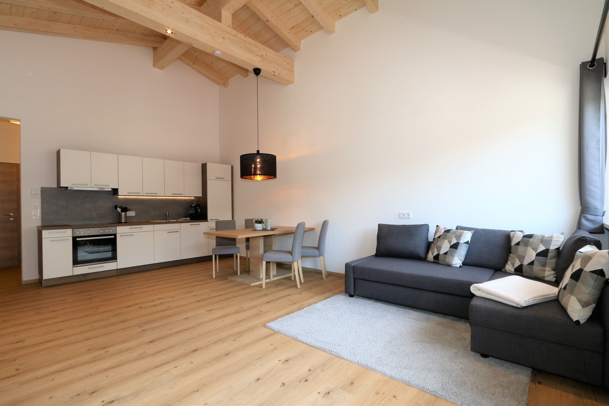 On the 1st floor: (Living/diningroom(single sofa bed, TV(satellite)), Bedroom with bathroom(double bed, shower, toilet), Bedroom with bathroom(double bed, shower, toilet))\n\nopen kitchen(stove, hob(4 ring stoves, ceramic), coffee machine, oven, dishwasher, fridge-freezer), balcony, parking, baby crib(free)