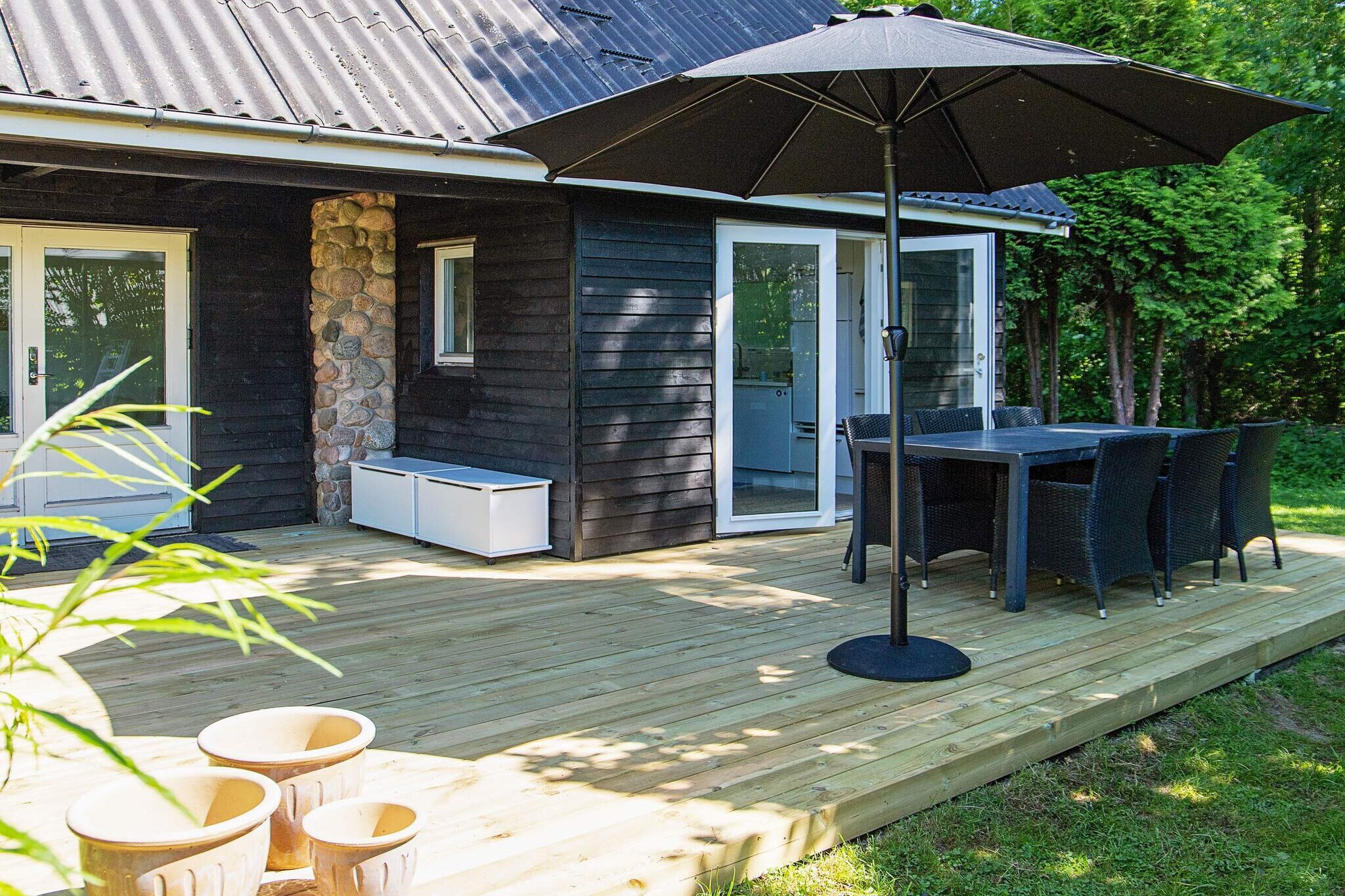 By Tårup Strand, this holiday home is located in a quiet holiday home area surrounded by beautiful nature. The beach is within walking distance and only approx. 1000 meters to campsite with kiosk. The cottage has a bathroom, two bedrooms and an open kitchen, which combines a dining room with a living room. The house appears cozy with furniture of more recent date. There is access to the terrace and garden from both the living room and kitchen. There is a natural plot of 681 m2 with an associated garden and terrace. On the terrace there is the opportunity for relaxation and barbecue. Ideal for families with children where the scenic surroundings must attract nature lovers. In the backyard there is a fenced bog so children need to be careful. Not for rent to youth and artisan groups.
A refundable deposit might be charged closer to your check-in date. This deposit covers utilities consumed during your stay and any additional services that may be taken. The final amount will be adjusted based on actual meter readings, actual usage of extra services, and any remaining balance will be refunded within 21 days after checkout.