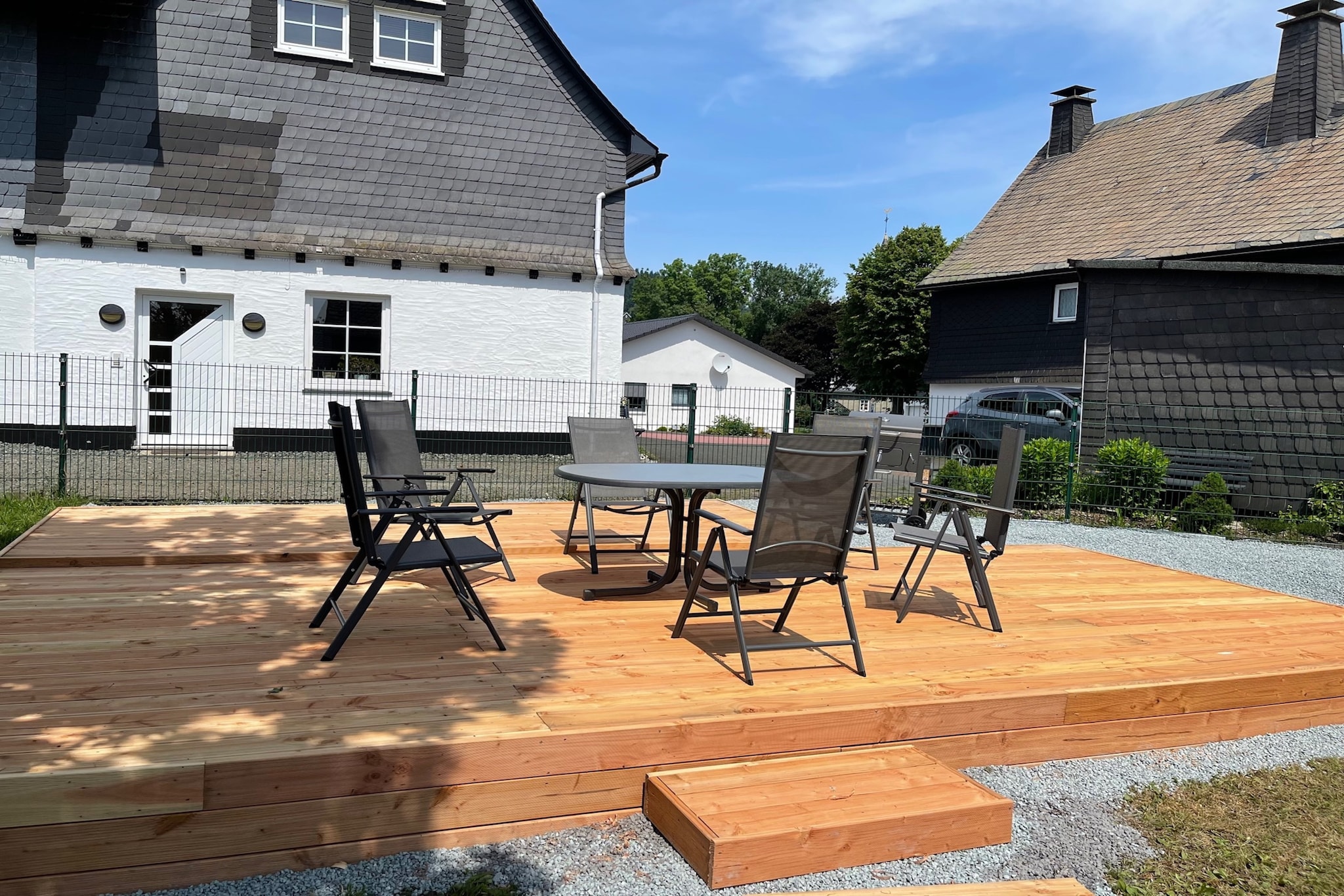 Ground floor: (Living room(double sofa bed, TV(flatscreen, satellite, dutch television channels)), Kitchen(dining table, electric kettle, cooker(ceramic), coffee machine(filter), oven, microwave, dishwasher, fridge), bedroom(double bed), bathroom(shower, washbasin, toilet, hairdryer), Landing)\n\nOn the 1st floor: (Kitchen(dining table, toaster, cooker, coffee machine(filter), oven, microwave, fridge), Kitchen(dining table, toaster, cooker, coffee machine(filter), oven, microwave, dishwasher, fridge), Living/bed room(double sofa bed, TV(flatscreen, satellite, dutch television channels), DVD player, radio, CD player), Living/bed room(double sofa bed, TV(flatscreen, satellite, dutch television channels)), bedroom(bunk bed), bedroom(double bed), Bedroom with bathroom(double bed, shower, washbasin, toilet), bathroom(bath tub, shower, washbasin, toilet, hairdryer), bathroom(shower, washbasin, toilet, hairdryer), Landing)\n\nstorage, cot, washing machine, heating, terrace(shared with other guests), garden(shared with other guests), parking, high chair