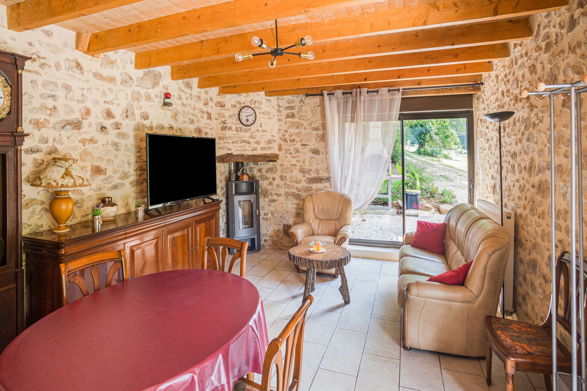 Stone holiday home in Saint-Cernin-de-l'Herm with pool