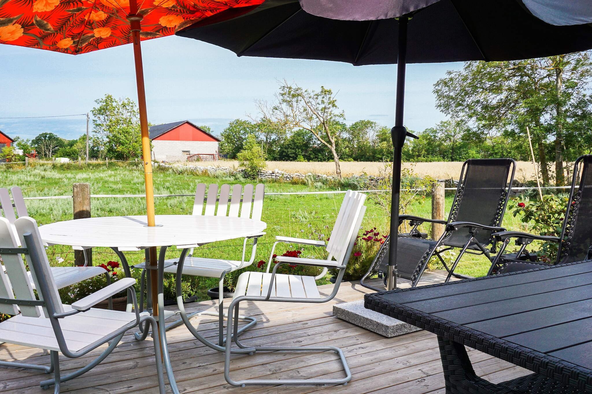 Nice holiday home with many beds, where you have a fantastic garden and the proximity to KÃ¶pingsvik and Borgholm. The house has been Pinnekulla's old school and has a lush lovely garden you can enjoy in, here are various fruit trees and a walnut tree. There is a covered terrace where you can really enjoy breakfast or a bite to eat together. There is a great atmosphere and plenty of seating if you are more. There is also a terrace behind the outbuilding facing the beautiful fields / meadows, here is more comfortable lounge furniture and sun loungers. Here you can enjoy a glass of wine in the evening sun. Barbecue is available if desired. You also have a couple of bikes that the guest is responsible for as well as board games such as cube and badminton. The house has two large livingrooms. One of them is a combined living room/ dining room with a large rustic dining table with plenty of seating, as well as a large comfortable sofa group, tv and a desk. There is another living room with sofa, tv and two comfortable chairs. The kitchen with old-world charm is bright and well equipped. There is a dining table with kitchen sofa and chairs. Downstairs there is a double bedroom, as well as a small built-in bunk bed for 2 smaller children. Toilet with shower and sink and washing machine. Drying wick is in the garden. The upper floor which has sloping ceilings and lower to the ceiling has plenty of sleeping space, in one bedroom there are 2 beds, in the other there are 3 beds of which on one of the bed can be folded out to a double bed. The house is located next to a road, but is equipped with a fence. The cottage is not rented out to youth groups, parties. Here you stay in the middle of Ã–land with a perfect location for exploring. You are close to KÃ¶pingsvik (2.5km) with its popular fine beaches and Borgholm with its large restaurant selection. Everyone creates their favorite places on Ã–land, but Alvaret, Borgholm's castle ruins, Solliden, wonderful Byxelkrok and BÃ¶da's rolling beaches are popular places well worth a visit. Also take the opportunity to enjoy Ã–land's good body cakes.