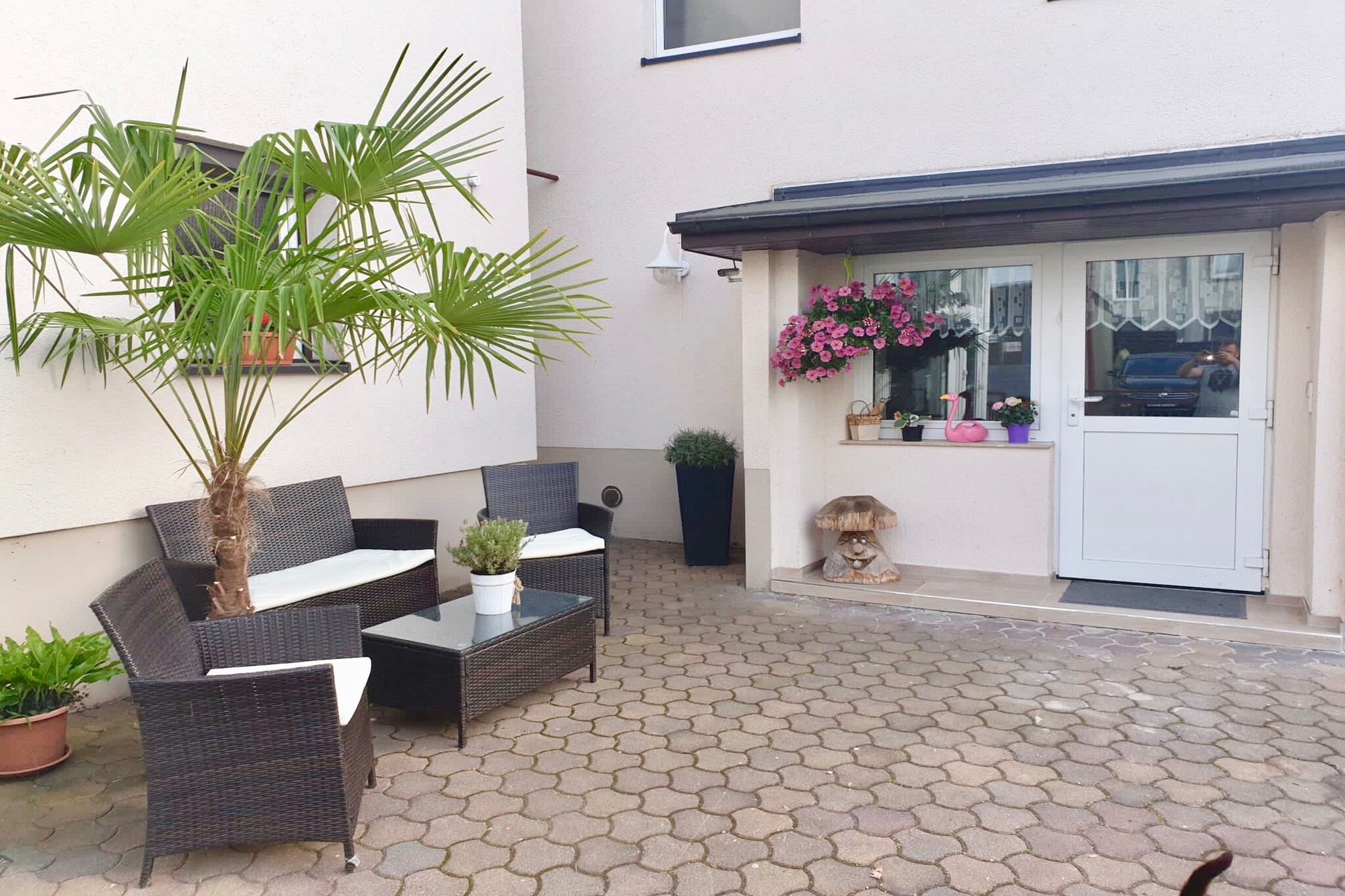 Ground floor: (Living room(single sofa bed, TV, dining table, seating area), Kitchen(electric kettle, cooker, hood, coffee machine, oven, microwave, fridge), bathroom(shower, washbasin, toilet), terrace)\n\nmezzanine: (bedroom(single folding bed(90 x 160 cm), double bed))\n\ngrill, garden furniture, parking