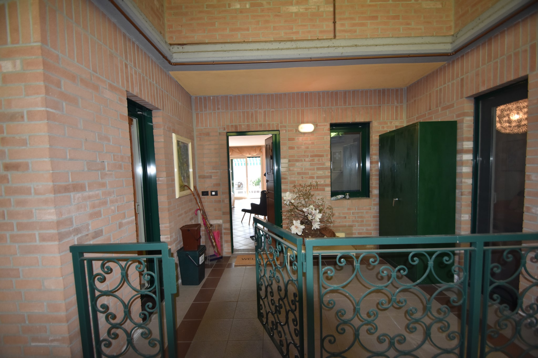 On the 1st floor: (Kitchen(hob, hood, oven, microwave, dishwasher, fridge-freezer), Living/diningroom(double sofa bed, TV, dining table, seating area), bedroom(double bed), bedroom(small double bed), bathroom(bath tub, washbasin, toilet, bidet), bathroom(shower, washbasin, toilet, bidet), washing machine)\n\nterrace, parking