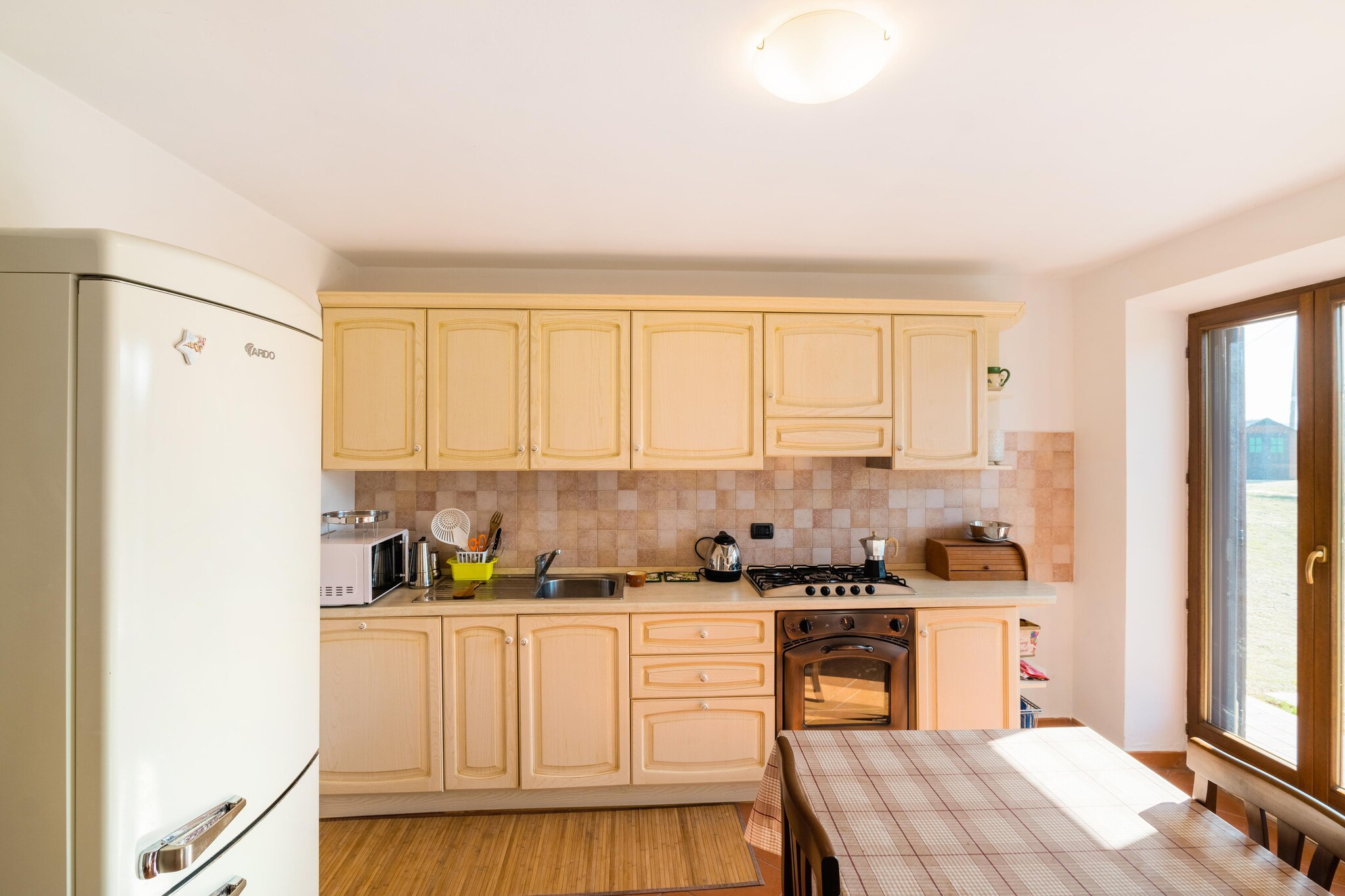 Ground floor: (Living room(single sofa bed), Kitchen(cooker, hood, oven, dishwasher, fridge-freezer), bathroom(shower, washbasin, toilet, bidet), washing room(washbasin, washing machine), hall(double sofa bed, TV, fireplace))\n\nOn the 1st floor: (bedroom(single bed, single bed), bedroom(small double bed), bedroom(double bed), bathroom(shower, washbasin, toilet, bidet), hall(double sofa bed, balcony or terrace))\n\nwireless music system, balcony or terrace, garden, BBQ, parking