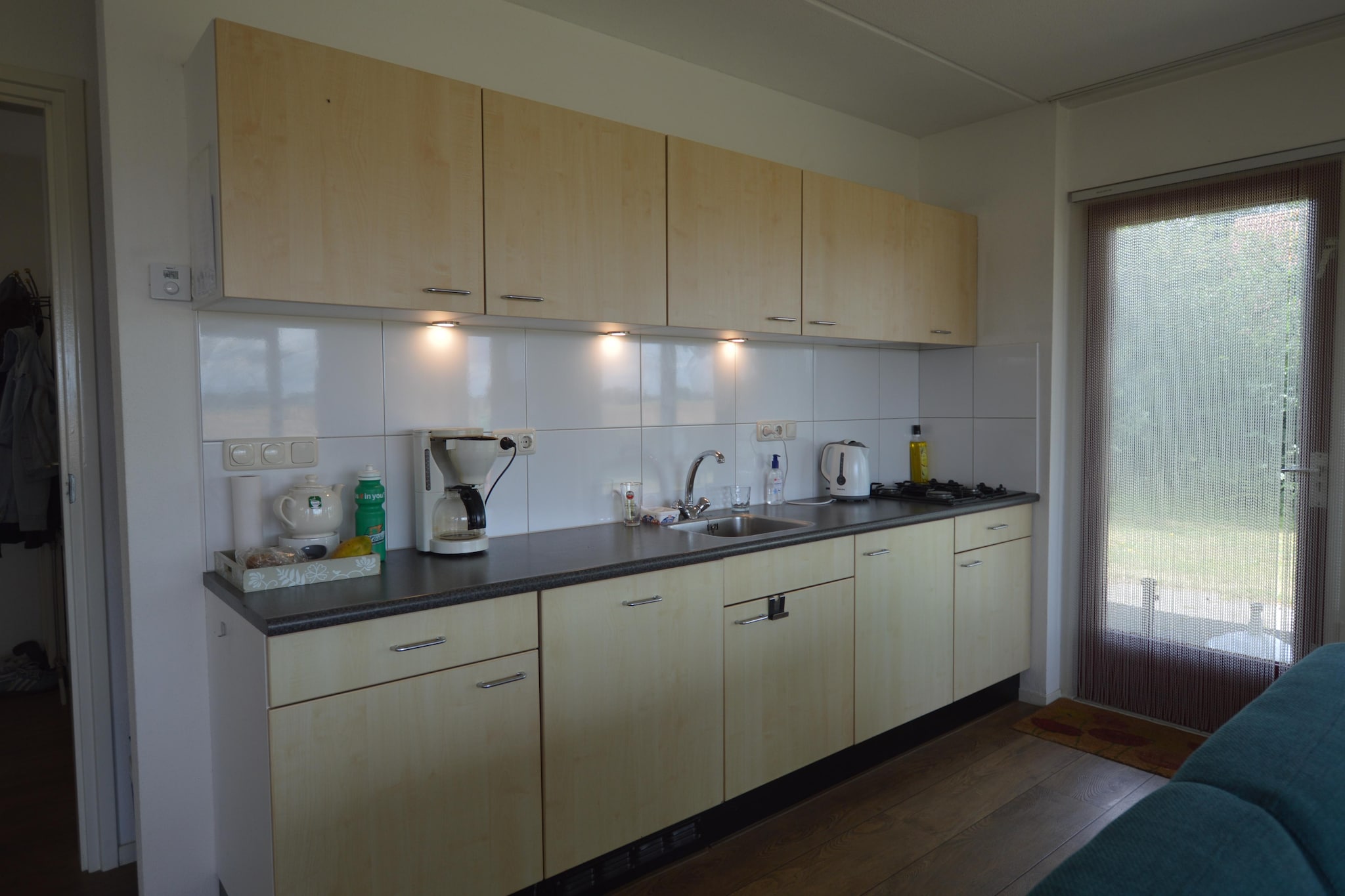 Ground floor: (hallway, Living room(TV(cable), DVD player, radio, CD player, stereo unit), open kitchen(coffee machine, oven, microwave, dishwasher, fridge-freezer), bedroom(single bed, single bed), bathroom(shower, washbasin))\n\nOn the 1st floor: (bedroom(single bed, single bed), bedroom(single bed, single bed), bedroom(single bed, single bed), bathroom(shower, washbasin, toilet, washing machine))\n\nconservatory/veranda, garden doors, heating, terrace, garden, bicycle storage, garden furniture, sun loungers, parking, parasol, boules court, play equipment, table tennis table, children\'s bed, high chair, ironing board