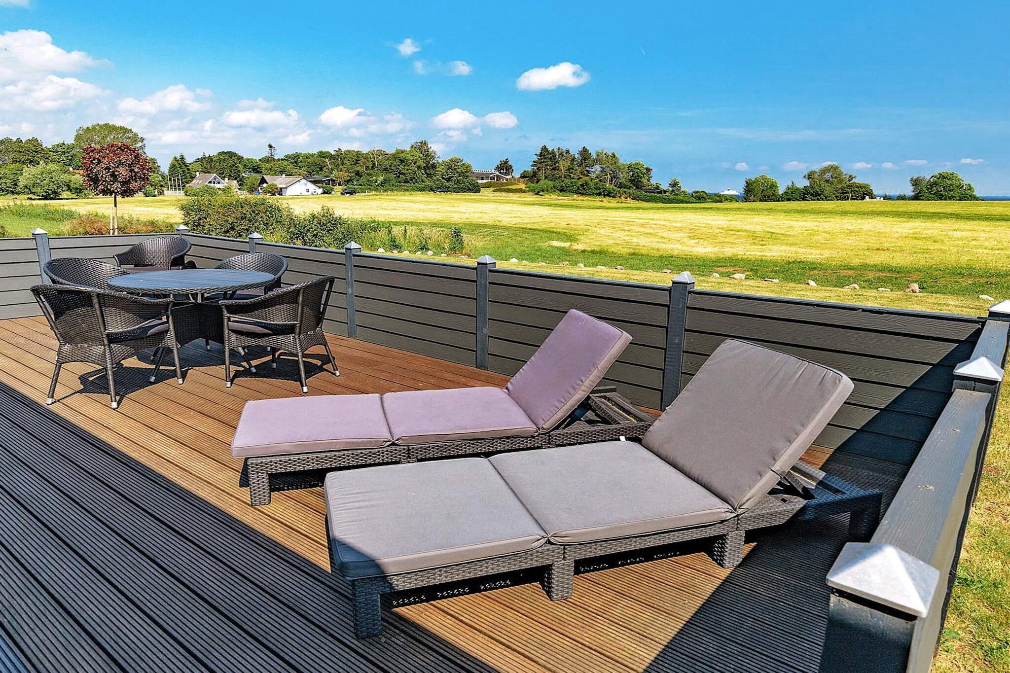 Vakantiehuis aan de kust met spa en sauna - Buitenlucht
