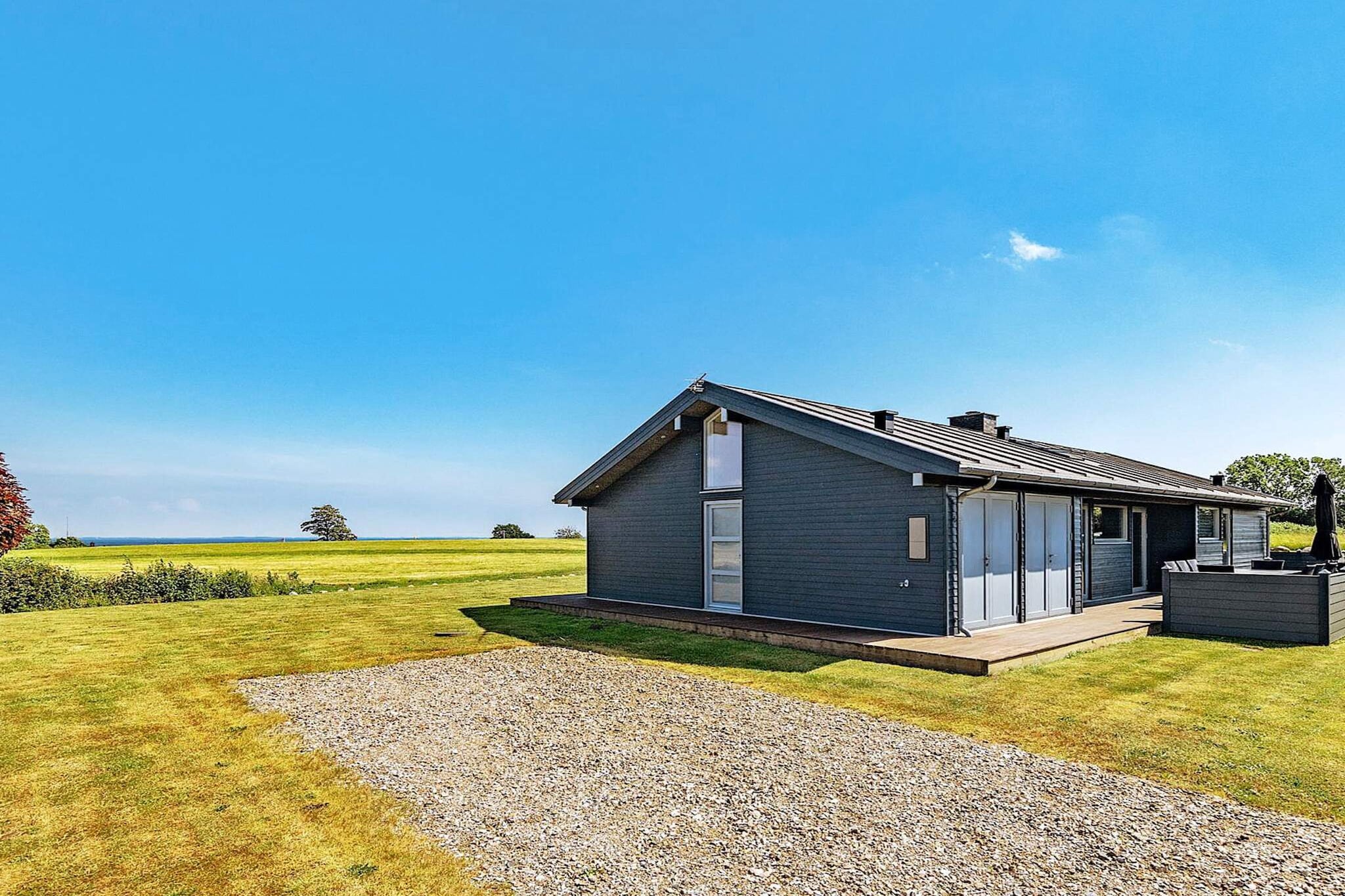 Vakantiehuis aan de kust met spa en sauna - Buitenlucht