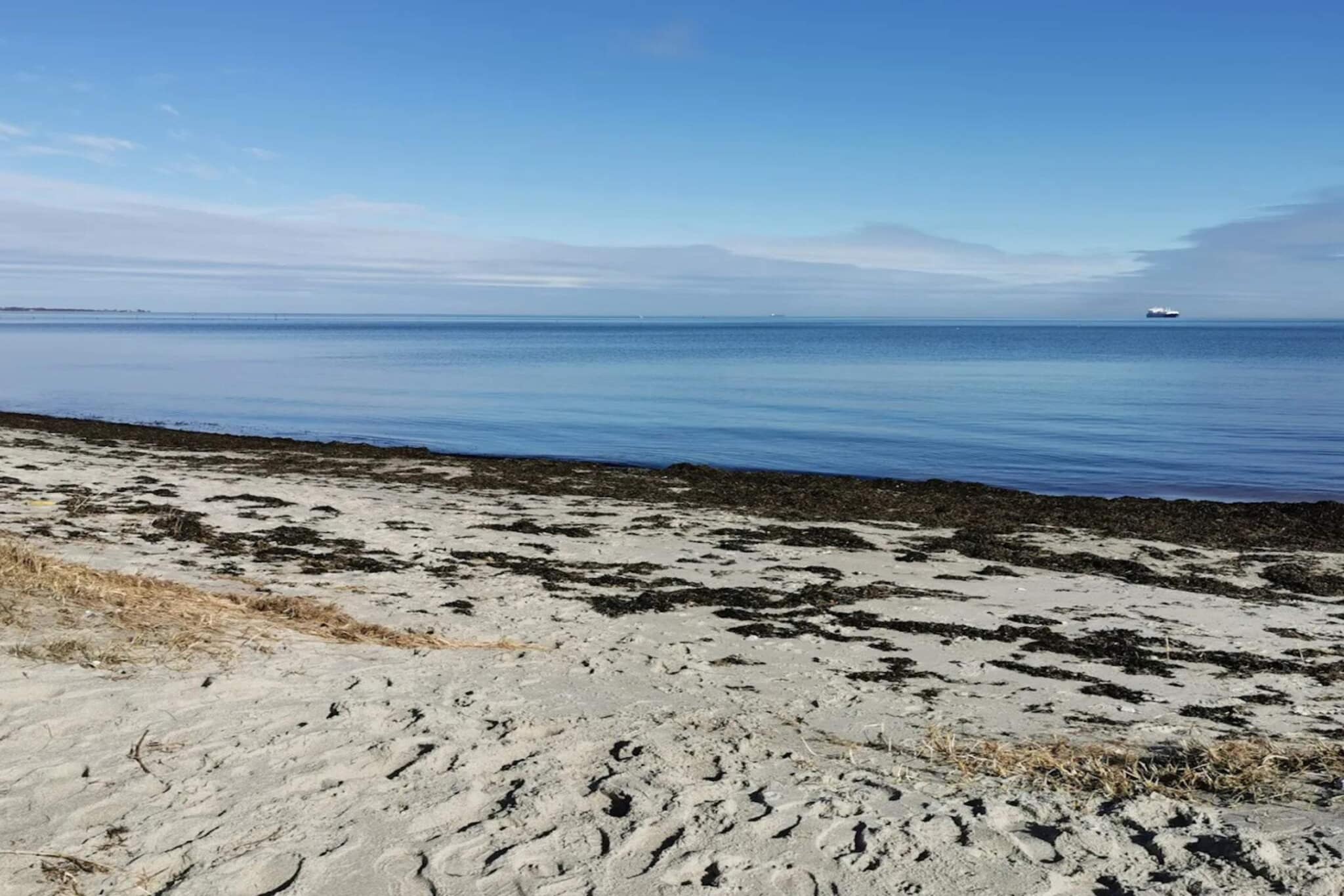 Vakantiehuis aan de kust met spa en sauna - Waterzicht