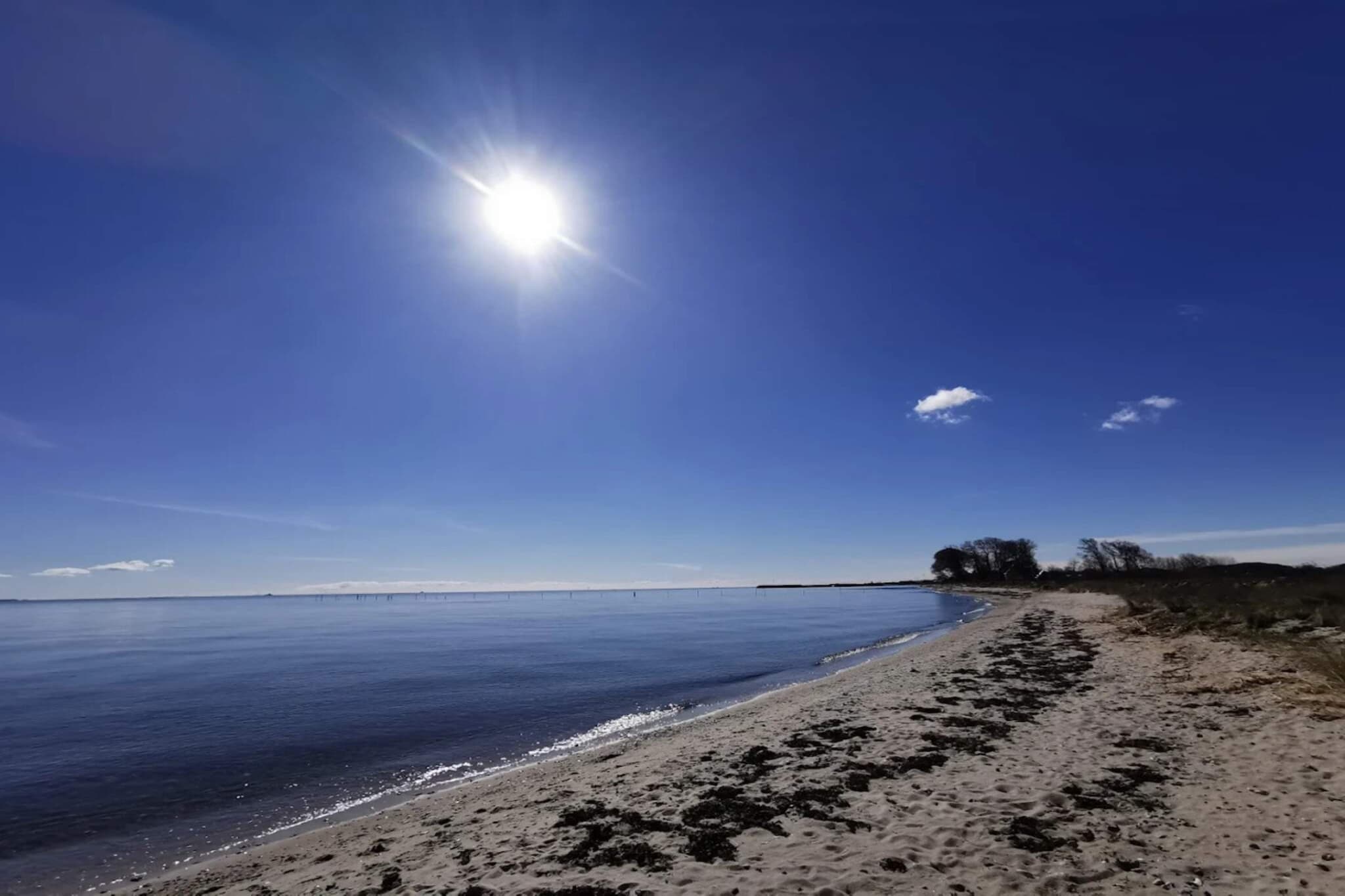 Vakantiehuis aan de kust met spa en sauna - Waterzicht