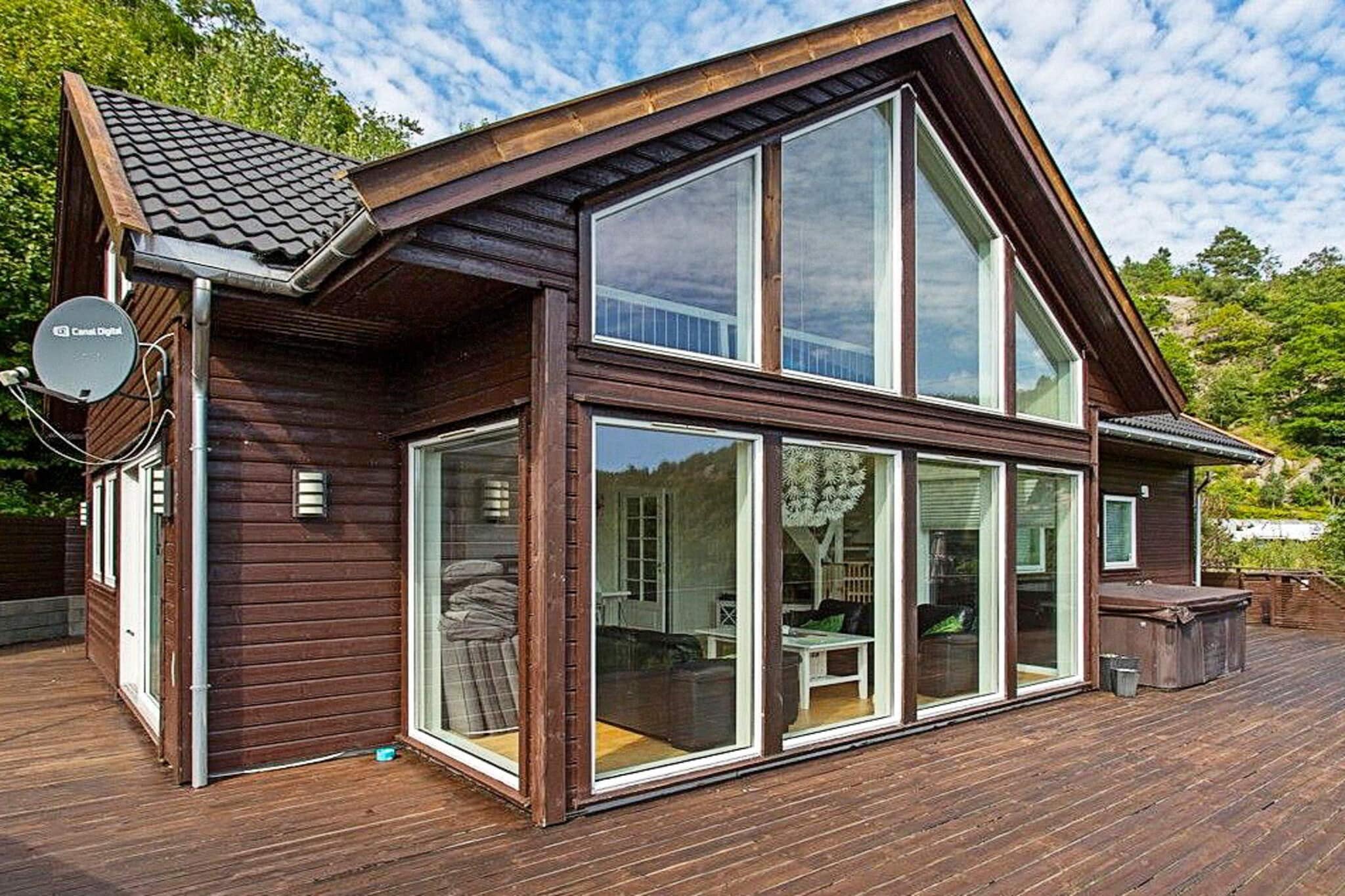 Lovely, modern holiday house with wonderful views of the sea. The holiday house was built in 2011 and modernized in 2020. Located in Fladstad approx. 10 km from Lyngdal city center. The house contains 2 living rooms and a large bathroom, 4 bedrooms with 2 beds each (120cm): 2 on the ground floor and 2 on the loft, also with a great view of the sea. 2 extra mattresses available. Gate on the stairs between the floors. Underfloor heating in all rooms on the ground floor. Beautiful kitchen in high-gloss white with integrated appliances and a double fridge/freezer. You will also find DVD, TV, satellite dish (Canal Digital). The holiday house has a large terrace with furniture and barbecue. A gate is mounted on the terrace. Short way to the floating pier where a berth is included in the rent. Firewood is not included but can be bought at Spangereid or from one of the neighbors. About 6 km to Spangereid, where you will find a grocery store and gas station. To Lyngdal it is approx. 10 km. Local attractions include Lindesnes lighthouse about 17 km away (Norway's southernmost point). Here is also an exciting museum. At Spangereid about 6 km you will find «Under», the world's only underwater restaurant. The Spangereid Canal is also worth a visit. Other attractions are the fishing village Korshavn about 20 km away, where you can rent a boat to Sælør or join arranged fishing trips. Sørlandsbadet in Lyngdal is popular, and in Skrelia approx. 12 km from Lyngdal you will find several hiking trails and Kvåsfossen salmon center which is also worth a visit. The hot tub is private and not included in the rental as it is out of order.