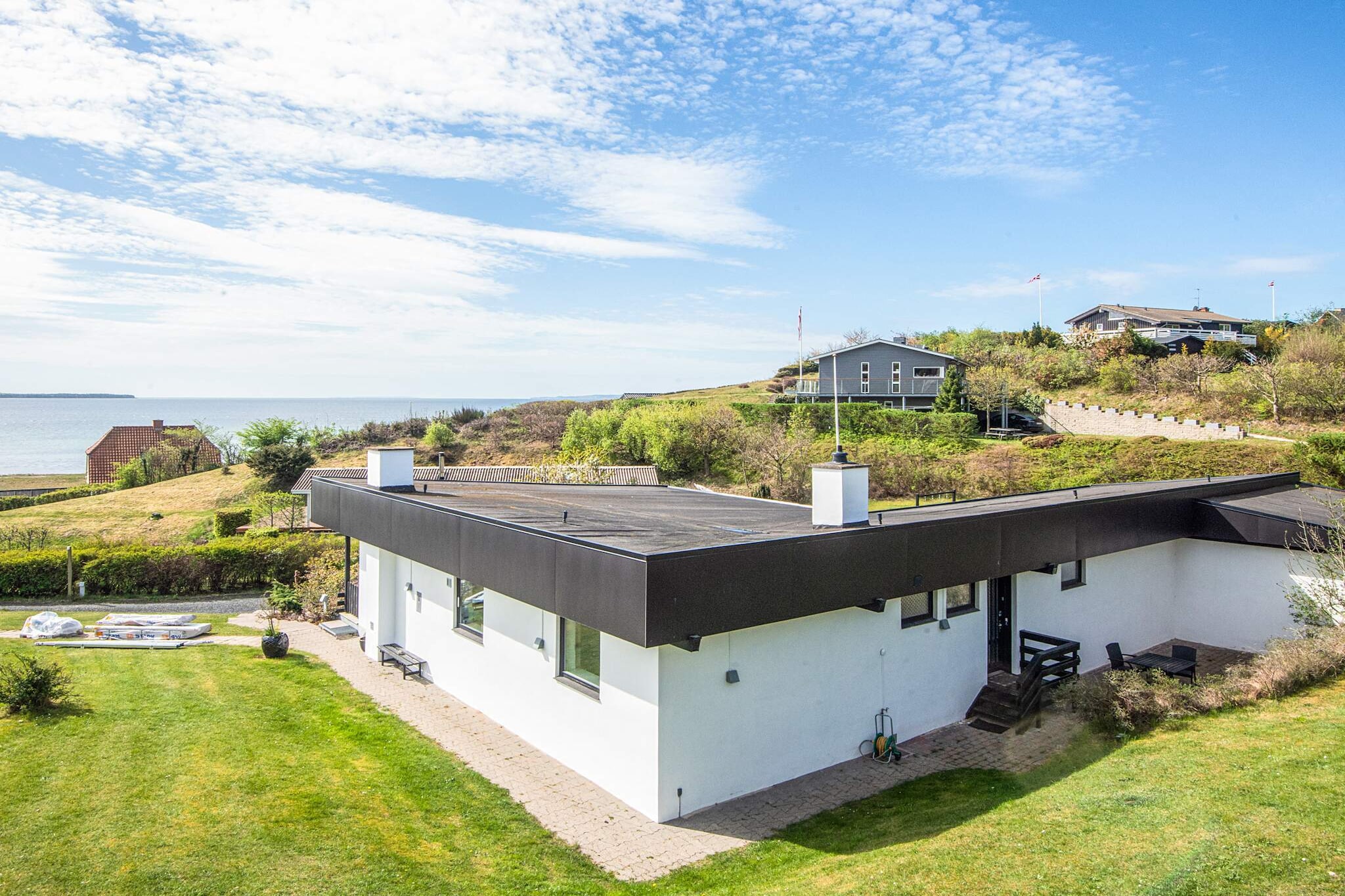 Gezinsvriendelijk huis aan het strand - Waterzicht