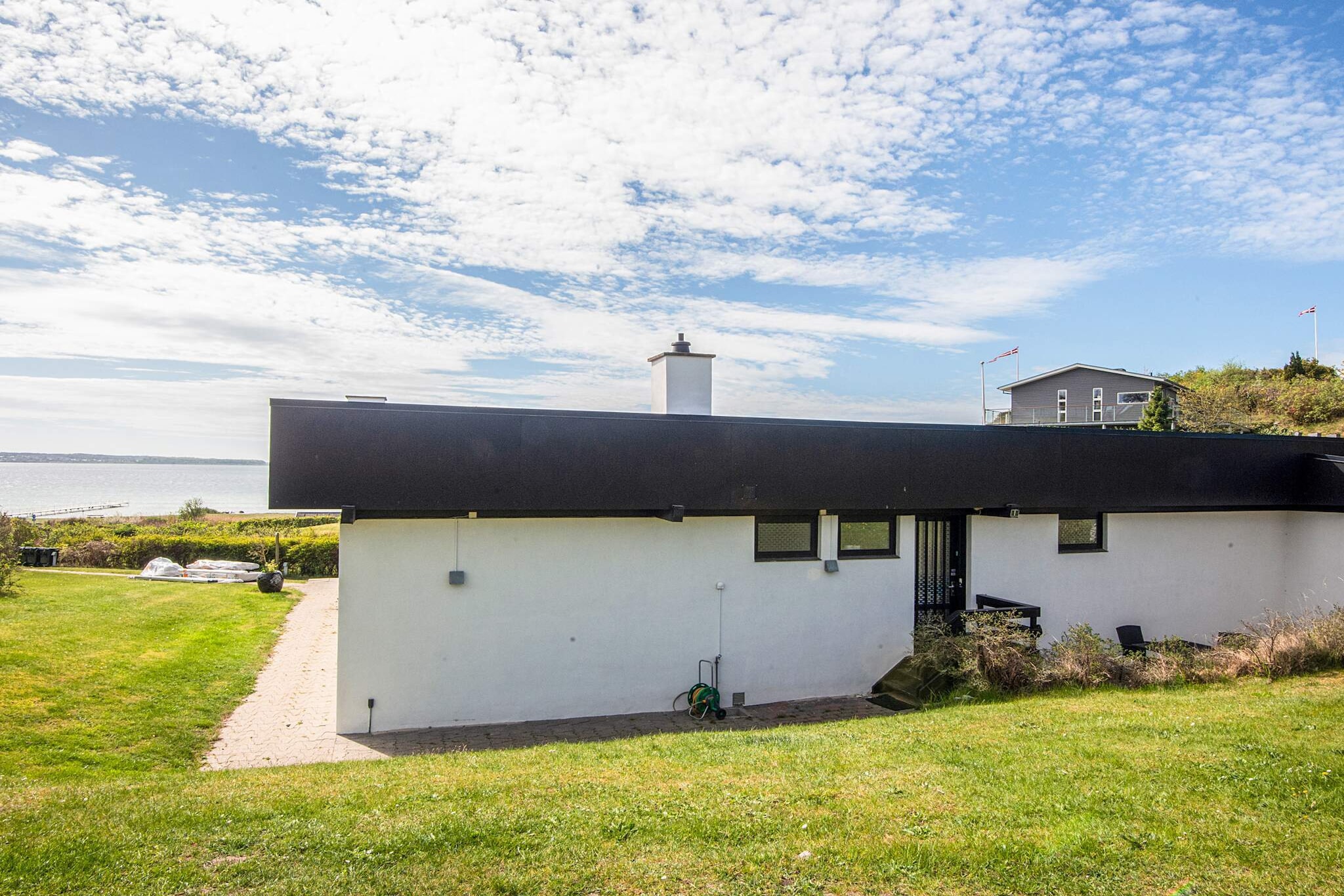 Gezinsvriendelijk huis aan het strand - Waterzicht