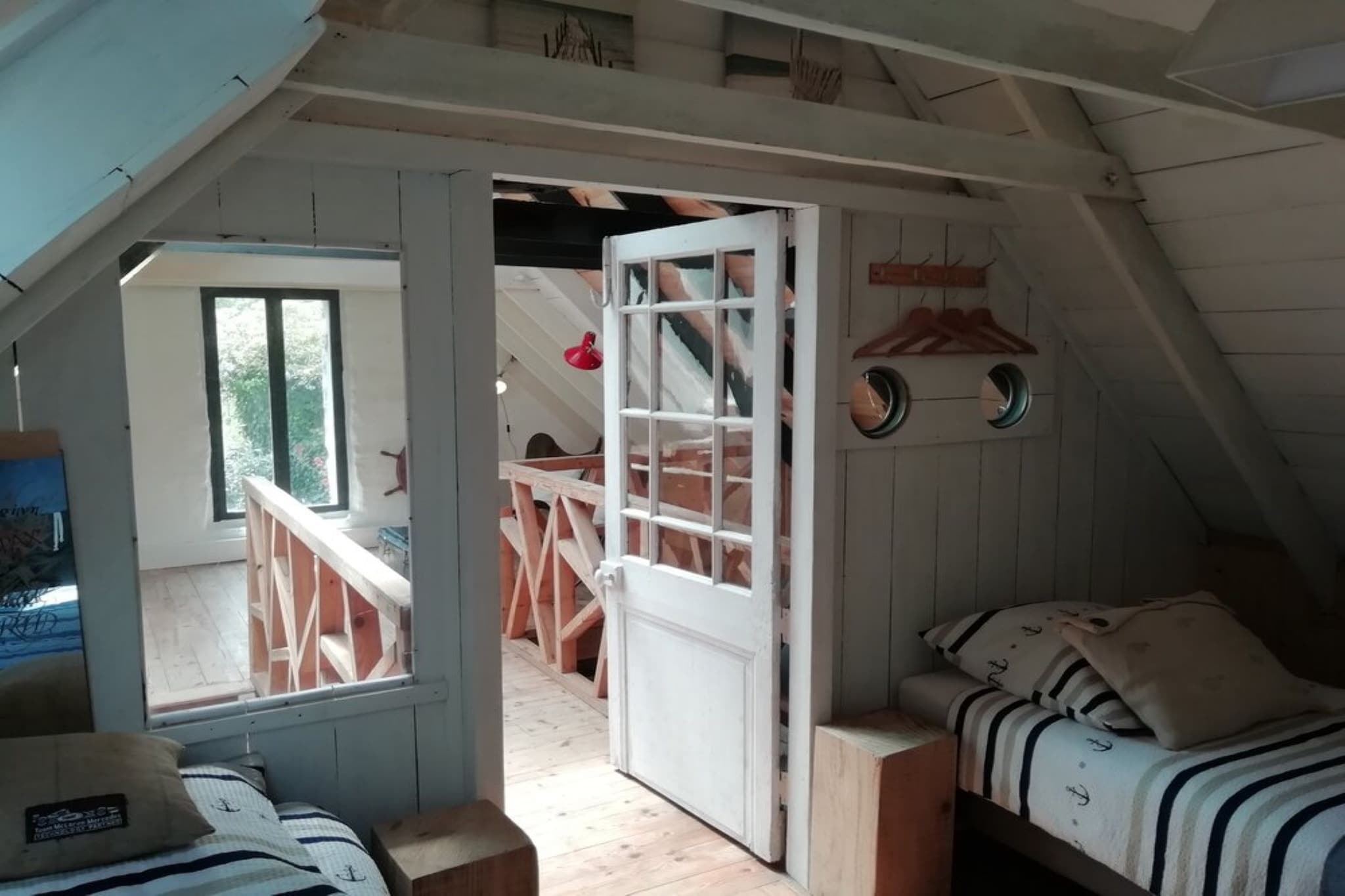 Guest house ground floor: (Living room(double sofa bed, TV, stove(wood)), open kitchen(dining table, electric kettle, cooker, oven, microwave, fridge), bathroom(shower, washbasin), toilet)\n\nGuest house on the 1st floor: (bedroom(double bed or 2 single beds), seating area)\n\nheating, terrace(roofed), garden(private), garden furniture, BBQ, high chair