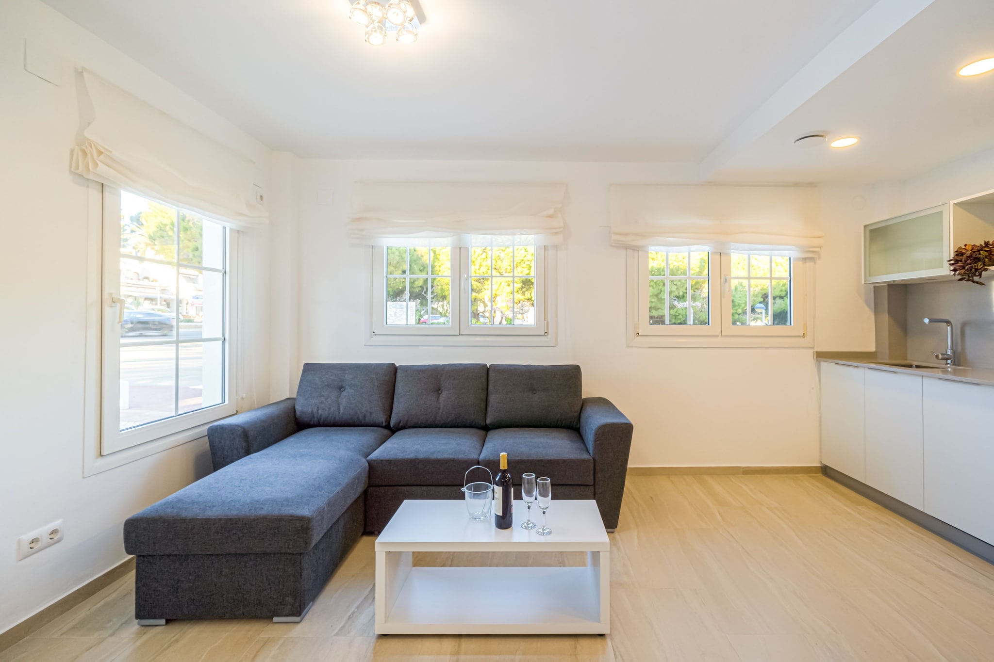 An optional utilities and service fee of EUR 90,00 will be charged before your arrival. Details are given below.<br> This charming ground-floor apartment in Moraira offers a relaxing stay just 100 meters from the beach and a short stroll from the town center. Ideal for families or small groups, it's perfectly positioned to explore the Costa Blanca's coastal gems. Nearby attractions include the scenic Playa del Portet, the historic Castillo de Moraira, and the panoramic Torre VigÃ­a Cap d'Or. For nature lovers, the nearby coves and walking trails offer unforgettable views of the Mediterranean. The apartment features a fully equipped kitchen with a coffee machine, oven, microwave, and dishwasher. The living/dining area includes a flat-screen TV and a dining table for four. With two bathrooms and two bedrooms, it comfortably accommodates up to four guests. Additional amenities include a washing machine, ironing facilities, mobile air conditioning, and a private terrace for outdoor relaxation. Surrounded by coastal charm, Moraira offers a vibrant culinary scene. Enjoy Mediterranean flavors at Restaurante Sand Moraira, creative tapas at Chic Gastronomic, or fresh seafood at El Cafeti de la Mar. Whether you're sunbathing, exploring historic sites, or dining al fresco, this apartment is a perfect base for your Costa Blanca adventure. <br><b> Optional Utilities & Service Package </b><br><b> An optional utilities and service package of EUR 90,00 </b> can be selected prior to your arrival. You will receive a separate communication with the payment link should you wish to include it.<br>This package ensures a seamless stay and conveniently covers services such as final cleaning, utility consumption, service support, and protection against minor damages or incidental costs during your stay.<br>Guests who prefer may manage these services independently, provided the property is returned in good order at check-out.