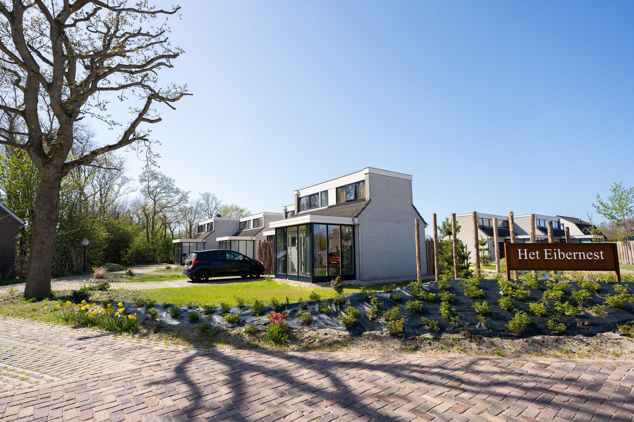 Maison de vacances chaleureuse avec Wi-Fi dans un parc de vacances situé à Texel