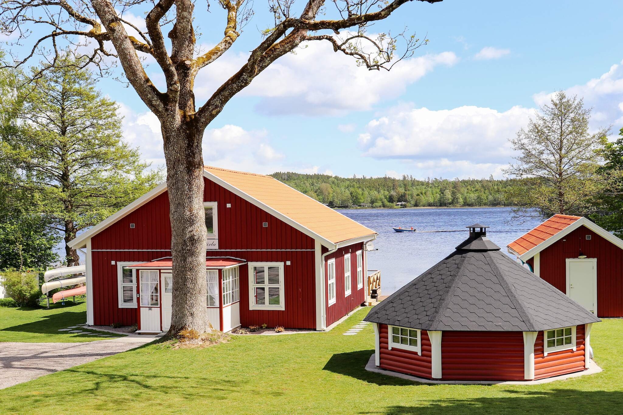 You have found a holiday home beyond the ordinary. A completely renovated, beautiful and modernly equipped house by the beautiful lake Unnen. You have your own jetty and terrace right by the water as well as a sauna and barbecue hut on the plot. A spacious house for several families or larger groups. Both rowing boats and canoes are available for fishing trips and experiences on the lake. Enjoy the lake's sparkling water, feel calm and hear the birds singing from the jetty and terrace. The entrance to the house is through a beautiful glass porch. The ground floor has two bedrooms with four and three beds respectively. Towards the lake there is a modern open kitchen and a large lovely dining area. There is one highchair for kids to use. A glazed conservatory with comfortable lounge furniture large modern TV and a lovely view of the lake. On the terrace you can almost dip your feet in the water. Upstairs there are two more bedrooms. One with four beds and one with three beds and a view of the lake. All bedrooms have a bathroom with shower and a wall TV. Throughout the house there is broadband and free wifi. In BV there is a laundry room with extra toilet. On the plot there is a lovely sauna where the whole party can be accommodated. You only take a few steps and can cool off in the small bathing area by the pier. On the plot there is also a large round barbecue hut with seating around the fireplace. Here you can enjoy food and drink on slightly chilly evenings. At the pier there is a rowing boat at your disposal and also three canoes. Life jackets are available to everyone, but it is up to you as guests to use the right size for each person. It is also possible to rent a fishing rod and SUP on site. More information about it can be found in the cottage. The lovely garden is cut by a robotic lawnmower, with the exception of the part closest to the water next to the house. Here you can have thing out on the lawn. But for everyone's comfort, let the robotic lawnmower take care of the rest of the large lawn. Lake Unnen has a nice fishing. There is plenty of time for large pike, pikeperch and perch. Fishing license required. In the community there is everything you need for your stay. The public bathing area has both a jetty and toilets. Across the road is the historic Alebo guest house, with restaurant. Make a visit to the nearby BÃ¤ckahÃ¤sten's stone oven bakery. A short drive away is Lake Bolmen. Here is everything for those interested in fishing. Bolmen is rich in different fish species, it is possible to rent a boat and book trolling. There is also a very nice fish restaurant and farm shop. Do you like peace and quiet, the company of the whistling of the wind and the rays of the sun through the greenery of the forest? Grass underfoot and a path to walk on? There are several nature reserves in the area, including Ã…rshultsmyren, a nature reserve near Lidhult. There are several golf courses in the area, the closest is RydÃ¶ Golf Club, about 16km away. NOTE: Source sorting of waste applies. Garbage must be disposed of in designated containers for recycling, etc. Warm welcome!