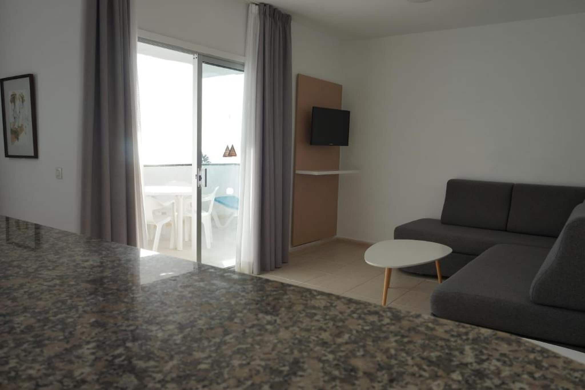 Basement: (Living room(double sofa bed), Kitchen(toaster, cooker, oven, microwave, fridge-freezer), bedroom(single bed, single bed), bedroom(single bed, single bed), bathroom(bathtub or shower))\n\nbalcony or terrace, swimming pool(shared with other guests)