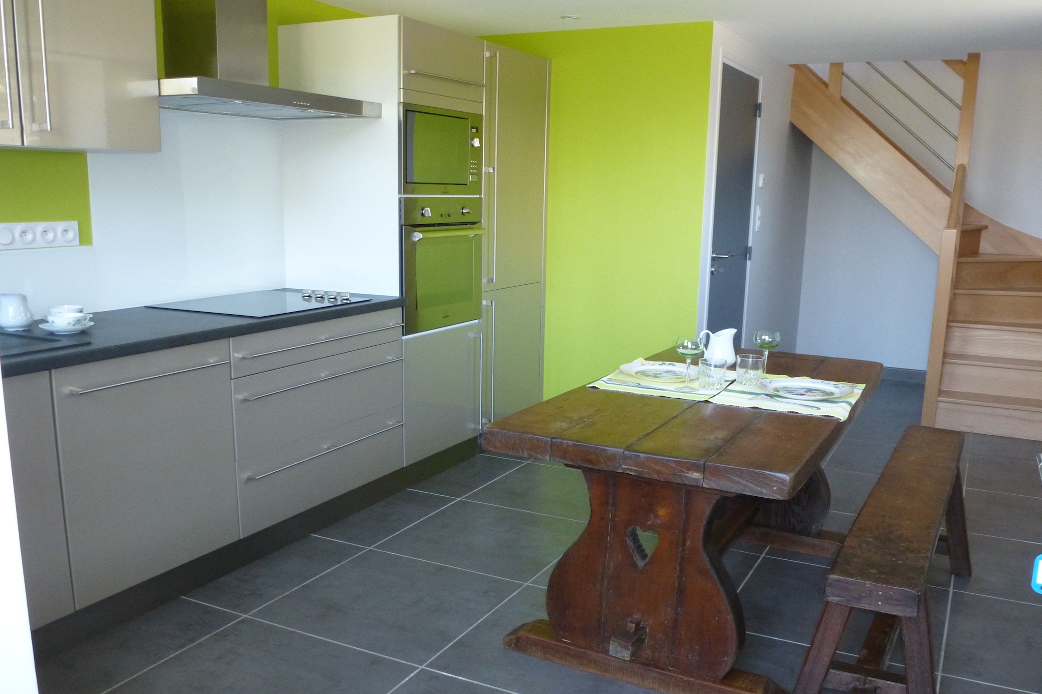 Ground floor: (Large kitchen(electric kettle, toaster, cooker(4 ring stoves, ceramic), coffee machine, oven, microwave, dishwasher, fridge, freezer), bedroom(double bed(160 x 200 cm)), bathroom(shower), toilet)\n\nOn the 1st floor: (Sitting room(TV), balcony)\n\nwashing machine, heating(electric), baby crib(paid)