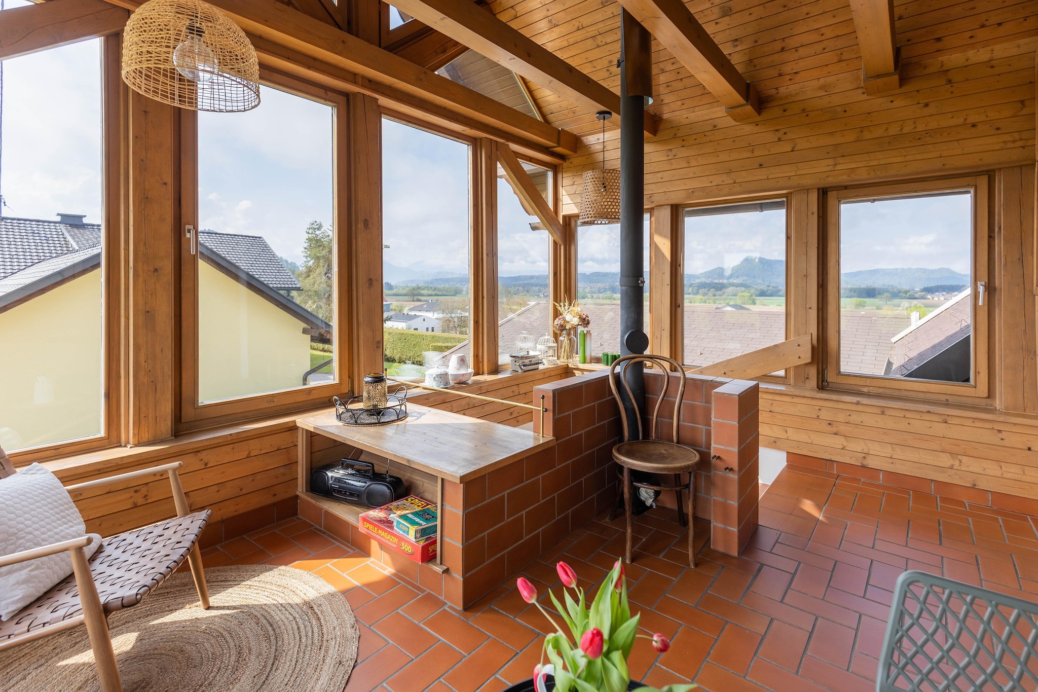 On the 1st floor: (Living room(single sofa bed, TV, dining table), Kitchen(hob, electric kettle, toaster, cooker, hood, coffee machine, oven, microwave, fridge), bedroom(double bed), bedroom(double bed), bathroom(shower, washbasin), bathroom(shower, washbasin), toilet(toilet), toilet(toilet), conservatory(seating area))\n\nbalcony, garden, garden furniture, BBQ, parking