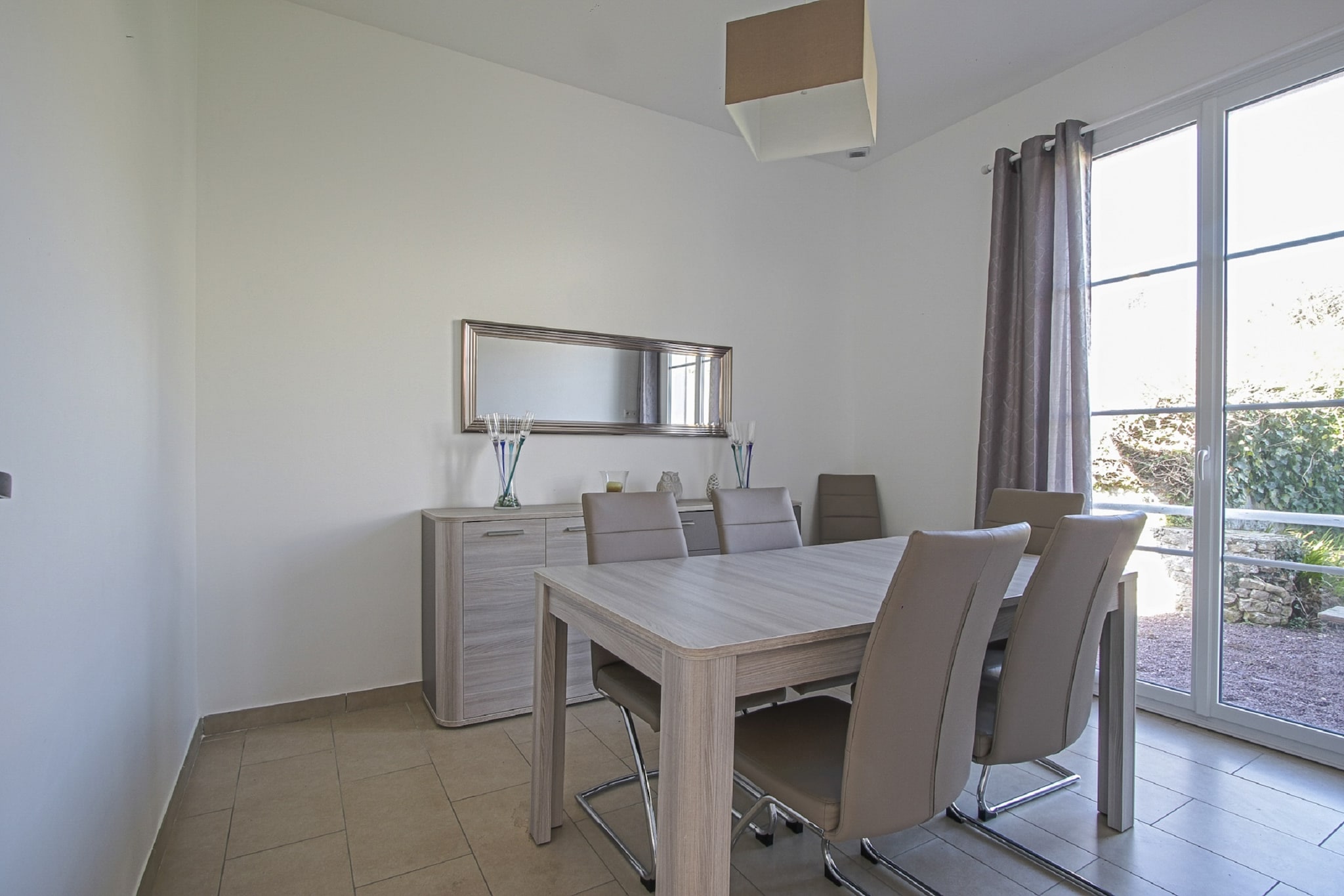 Treat yourself and your loved ones to a memorable holiday in this elegant coastal home in Aure sur Mer, Normandy. Just 100 meters from the North Sea beach, itâ€™s the perfect retreat for up to 6 guests. The house features a well-equipped kitchen, private parking, a cozy living room with a fireplace, and a sunlit terraceâ€”ideal for enjoying a quiet evening with snacks and drinks after a day of exploring.

The region offers much more than seaside relaxation. A short drive brings you to Bayeux, a town steeped in history and charm. Visit the stunning 13th-century Notre-Dame Cathedral and wander through the Jardin Botanique de Bayeux. Discover the famous MusÃ©e de la Tapisserie and the Museum of the Battle of Normandy, both offering deep insights into the regionâ€™s past.

Nature lovers will enjoy walks through the Marais du Cotentin et du Bessin, while nearby gardens like the Jardin du Souvenir offer peaceful reflection. Whether you're sunbathing, sightseeing, or simply unwinding, this holiday home promises comfort, culture, and coastal charm.