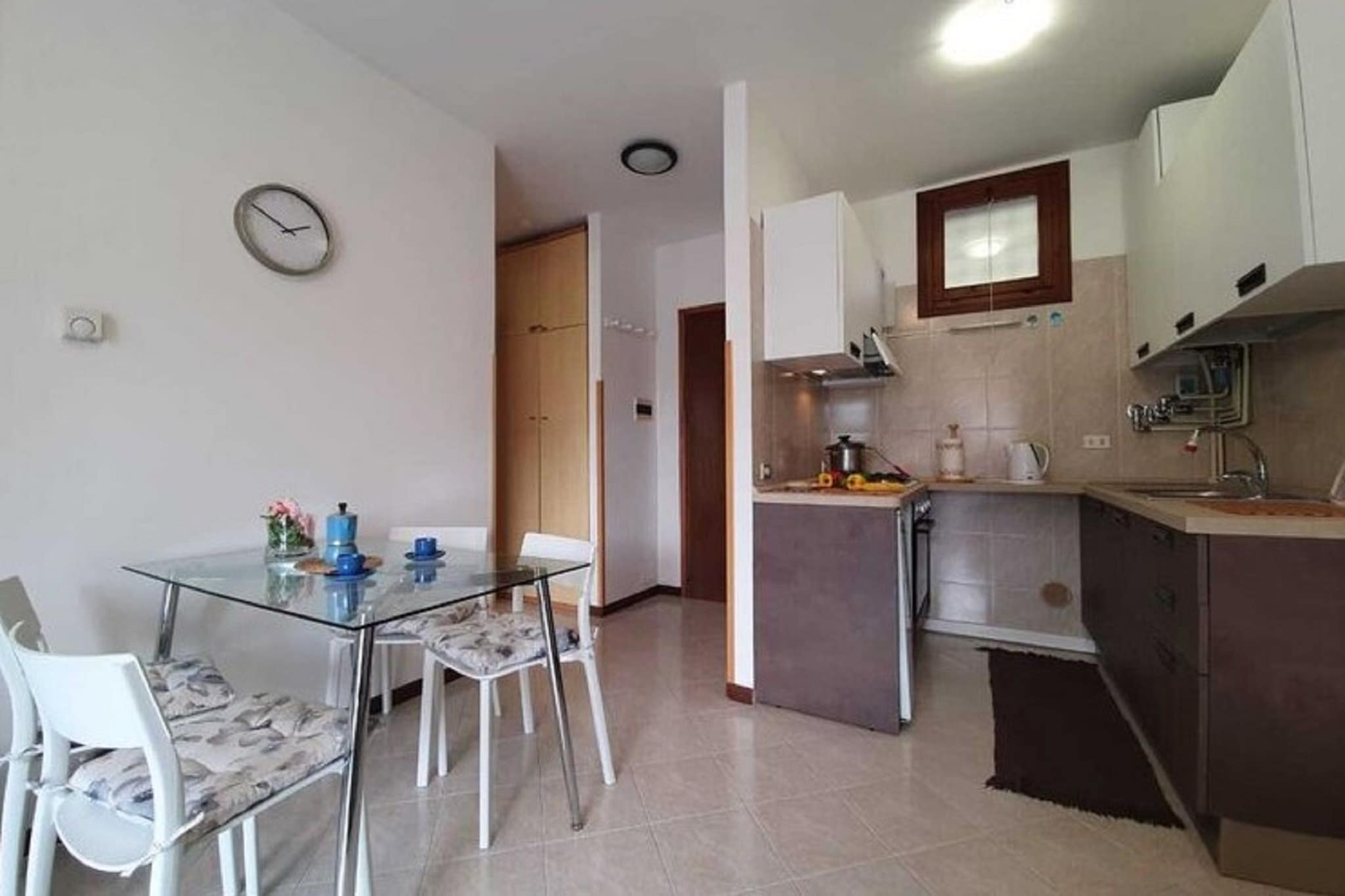 Ground floor: (Living room(seating area), open kitchen(hob, oven, dishwasher, fridge-freezer, washbasin), bedroom(double bed), bathroom(shower, washbasin, toilet, bidet))\n\ngarden, garden furniture, parking, swimming pool(shared with other guests, opened from Jun upto and including Aug)