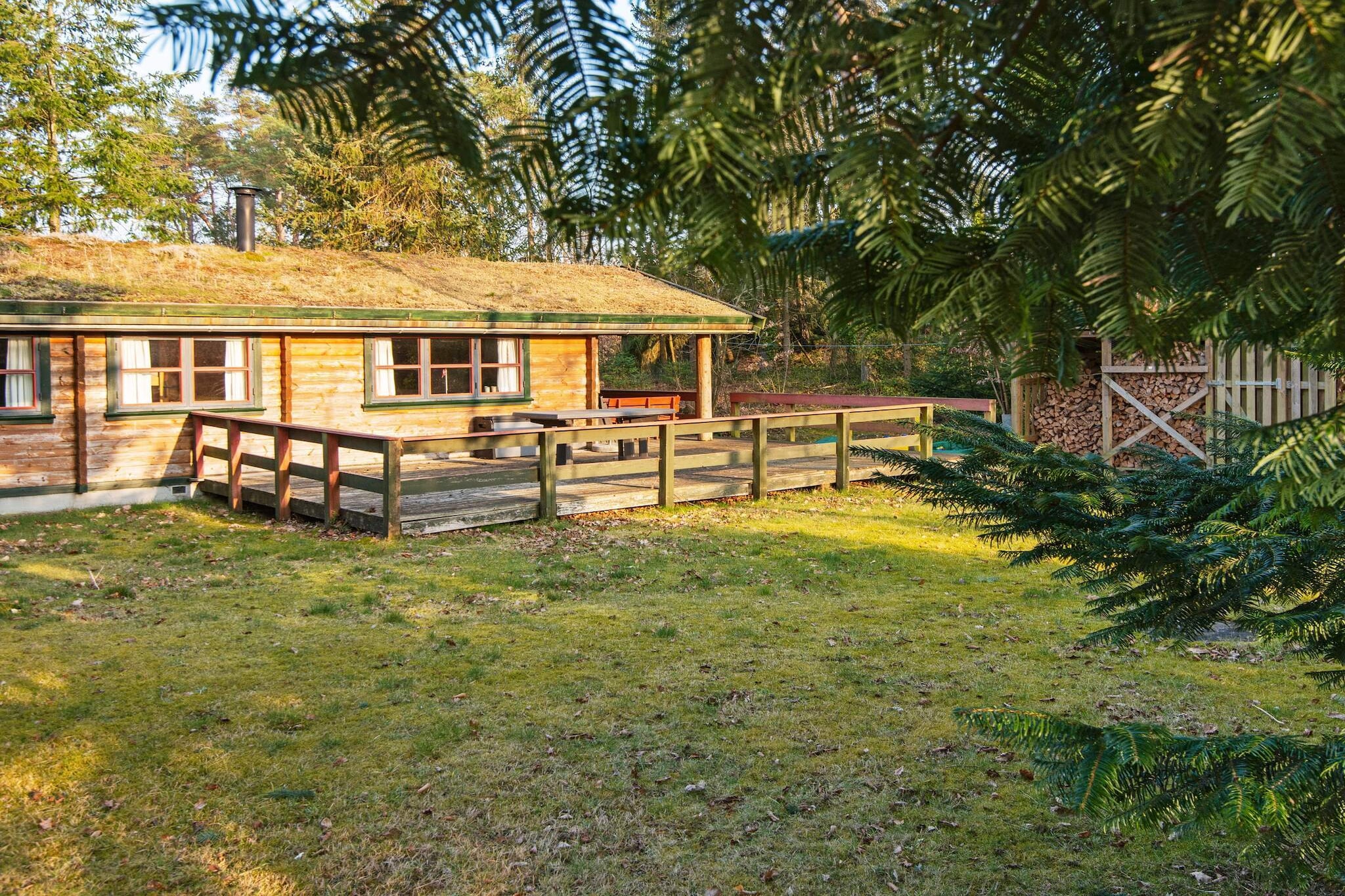 Discover the charm of this rustic, cosy holiday home with its traditional grass roof, nestled in the peaceful village of Ebdrup. Set on a spacious natural plot, it offers plenty of room for outdoor games, sports, or simply relaxing in the fresh air. Gather around the fire pit for campfires and memorable evenings under the stars. Inside, the home is thoughtfully arranged for family life. Next to the entrance hall, you’ll find two bedrooms and a bathroom. The double bedroom features 220 cm-long duvets for restful nights, while the adjoining room with bunk beds includes a 140 cm-long cot. A small extra room offers a perfect play space for children. The open kitchen with a cooking island flows seamlessly into the dining and living area, where a cosy wood-burning stove sets the mood for warm family gatherings. A climate-friendly heat pump keeps the home comfortable year-round. From the living room, you can step into an additional room, perfect for quiet moments or reading. Surrounded by flourishing flora and abundant fauna, this tranquil holiday home invites you to slow down, enjoy nature, and make lasting memories with family and friends. Every corner has been designed to blend comfort with charm, creating a serene retreat in the heart of Ebdrup. Please note: no rentals to youth groups.A refundable deposit might be charged closer to your check-in date. The security deposit ensures a smooth stay and covers any additional services or consumption charges.This deposit covers utilities consumed during your stay and any additional services that may be taken.The final amount will be adjusted based on actual meter readings, actual usage of extra services, and any remaining balance will be refunded within 21 days after checkout.This deposit simply acts as a prepayment for charges that  you would anyways pay for, ensuring a seamless stay and check-out experience.