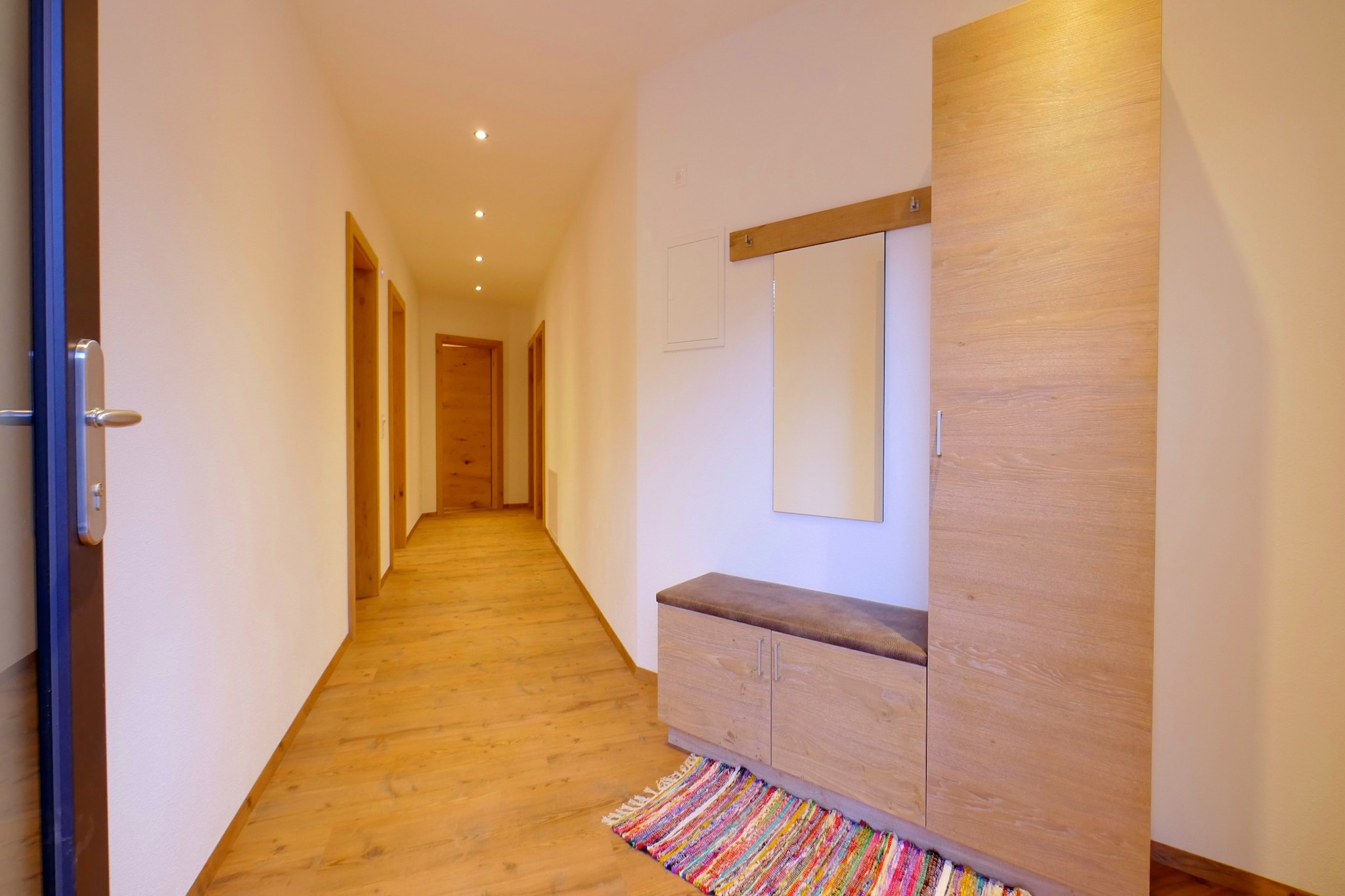 Ground floor: (Entrance, Living room(double sofa bed, TV(satellite), dining table), open kitchen(hob(4 ring stoves, ceramic), electric kettle, coffee machine, oven, microwave, dishwasher, fridge-freezer), bedroom(double bed), bedroom(single bed, double bed), bathroom(shower), toilet, ski storage(ski boot heaters), Parking, terrace, garden furniture)