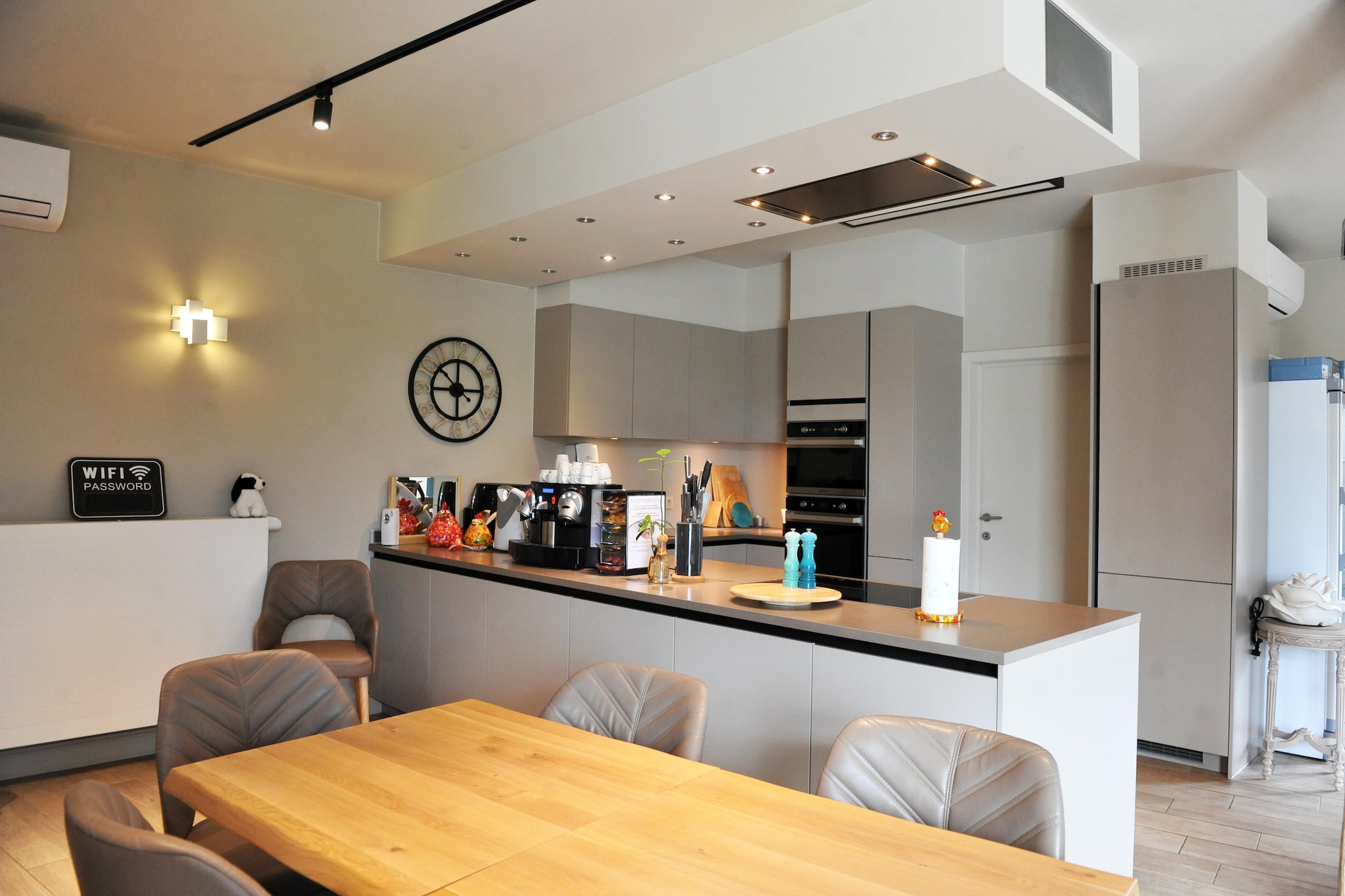 Ground floor: (open kitchen(dining table, stove, microwave, fridge, hairdryer), Living/bed room(double sofa bed, TV, seating area), bedroom(double bed), bathroom(shower, washbasin, toilet))\n\ntumble dryer, washing machine, garden, BBQ, parking, swimming pool(shared with other guests)