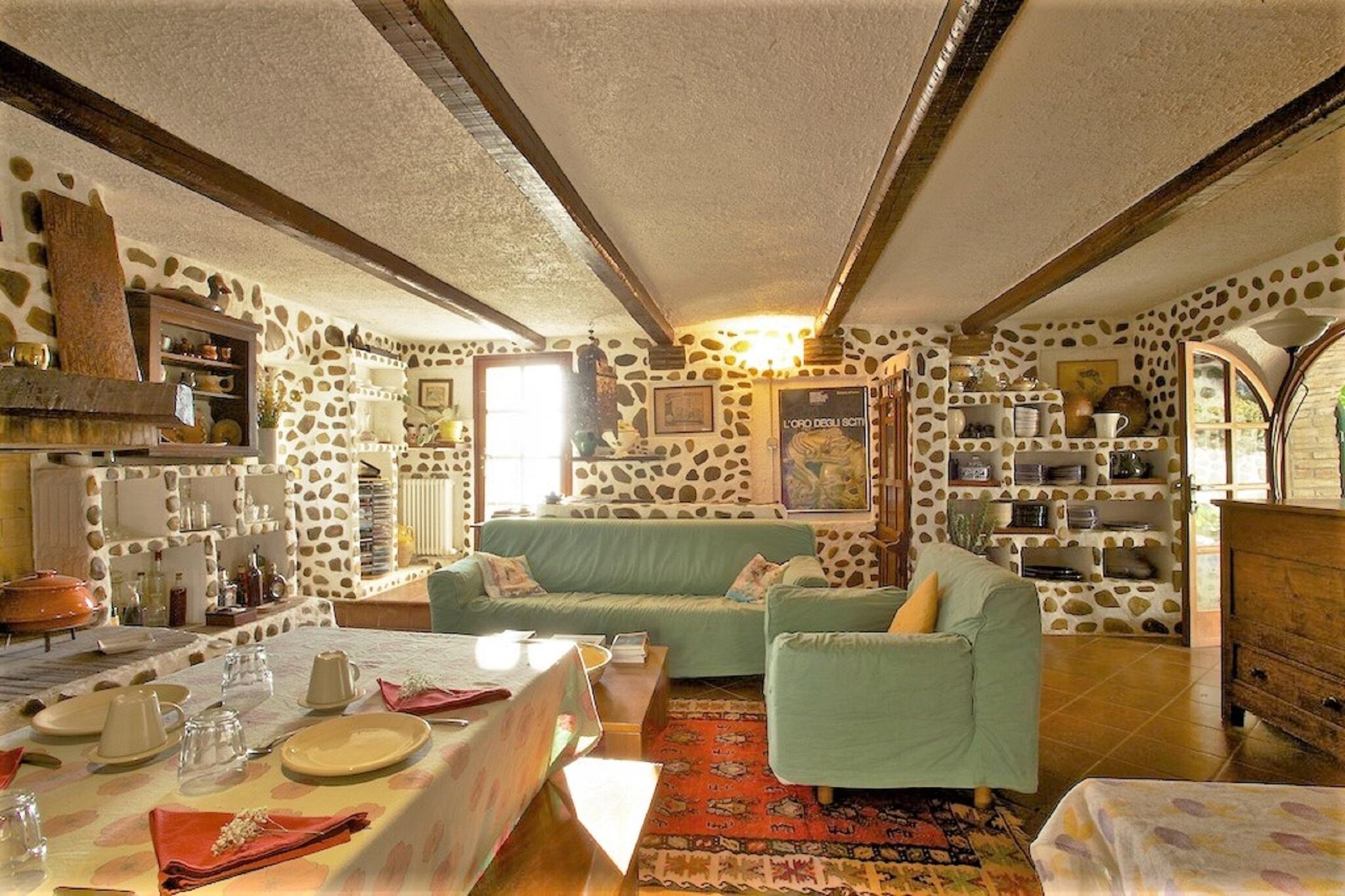 This lovely holiday home is surrounded by greenery and offers a large outdoor area with attractive furniture. Take a refreshing dip in the pool and light the barbecue for a cosy summer afternoon. This house is perfect for a family or a group of friends.
In the region, you can unwind in a natural setting. Enjoy the most beautiful walks through the forest or visit the Republic of San Marino (34 km), the thermal baths of Bagno di Romagna (33 km), the historic villages of Verucchio (30 km) or San Leo (23 km). The Riviera Romagnola offers several fun amusement parks and lovely beaches.
All rooms have a private entrance and are not interconnected. Parking is available and you can relax with a glass of wine on the terrace. The holiday flat also has a washing machine, so you don't have to travel too heavily packed.
About Belvilla
When you stay in a Belvilla home, you can rest assured of a unique holiday home in ideal surroundings at an attractive price. The portfolio of accommodations consists of more than 40,000-holiday homes in 20 European countries. Interested in a weekend getaway, a summer or winter sports holiday or simply a short break? Do you prefer the coast, the countryside or the mountains? Whatever your preference, there is a Belvilla home to meet your needs, from a cosy gîte for two to a castle big enough for the entire family, from an apartment in the heart of Rome to a cabin in the middle of nowhere, from a simple tree house to a luxury dream villa and from close to home to the other side of Europe.
A Belvilla home gives you the freedom to enjoy breakfast in your pyjamas or continue a good conversation into the morning hours without having to worry about the bar's closing time. Prepare gourmet meals with fresh local ingredients in your own kitchen and take advantage of having your own swimming pool to do as many cannonballs as you want! In other words, you can enjoy complete privacy in your home away from home.