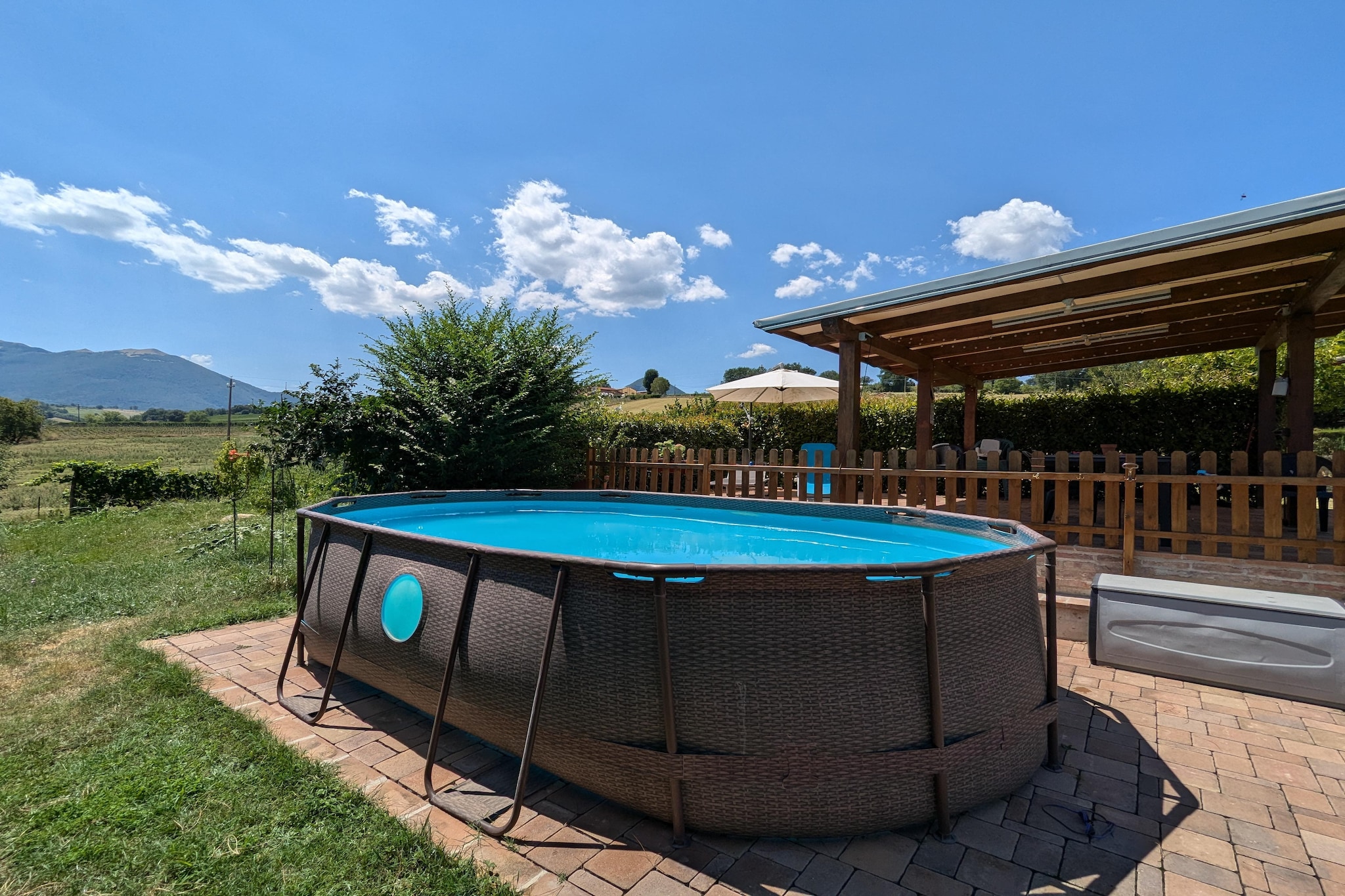 An optional utilities and service fee of EUR 85,00 will be charged before your arrival. Details are given below.<br> Want to experience the countryside and wine? Want to discover true hospitality?
This is the right place for you. In a 15,000-square-meter, fully fenced area, you can feel more than at home and appreciate the authenticity of rural life. You're in a typical Marche farm with farmyard animals and two charming donkeys in their enclosure, ready to be petted. Another highlight: honey production. The owners, who live with their family in an adjacent building, are an added bonus to your holiday. They're kind and discreet, and will welcome you and show you the most authentic aspects of the area. There's also an outdoor space for exclusive use for dining and relaxing. The garden, patio, and pool are shared spaces.
The recently renovated apartment is spacious and bright. One bedroom features a small "office corner" with a screen that can also be used as a smart TV.
The kitchen is equipped with everything you need, including a wine refrigerator-after all, we're in the land of Verdicchio DOC di Matelica. This will be a highlight of your stay. The area is full of wineries, and the owner will be happy to accompany you, if you wish, for tastings and visits to wineries. Upon arrival, you'll also receive a voucher with a 10% discount on all wines. The property also includes a small orchard, olive grove, vineyard, and vegetable garden; during the right seasons, guests can actively participate
in the various harvests, winemaking, and production of locally produced cured meats. <br><b> Optional Utilities & Service Package </b><br><b> An optional utilities and service package of EUR 85,00 </b> can be selected prior to your arrival. You will receive a separate communication with the payment link should you wish to include it.<br>This package ensures a seamless stay and conveniently covers services such as final cleaning, utility consumption, service support, and protection against minor damages or incidental costs during your stay.<br>Guests who prefer may manage these services independently, provided the property is returned in good order at check-out.