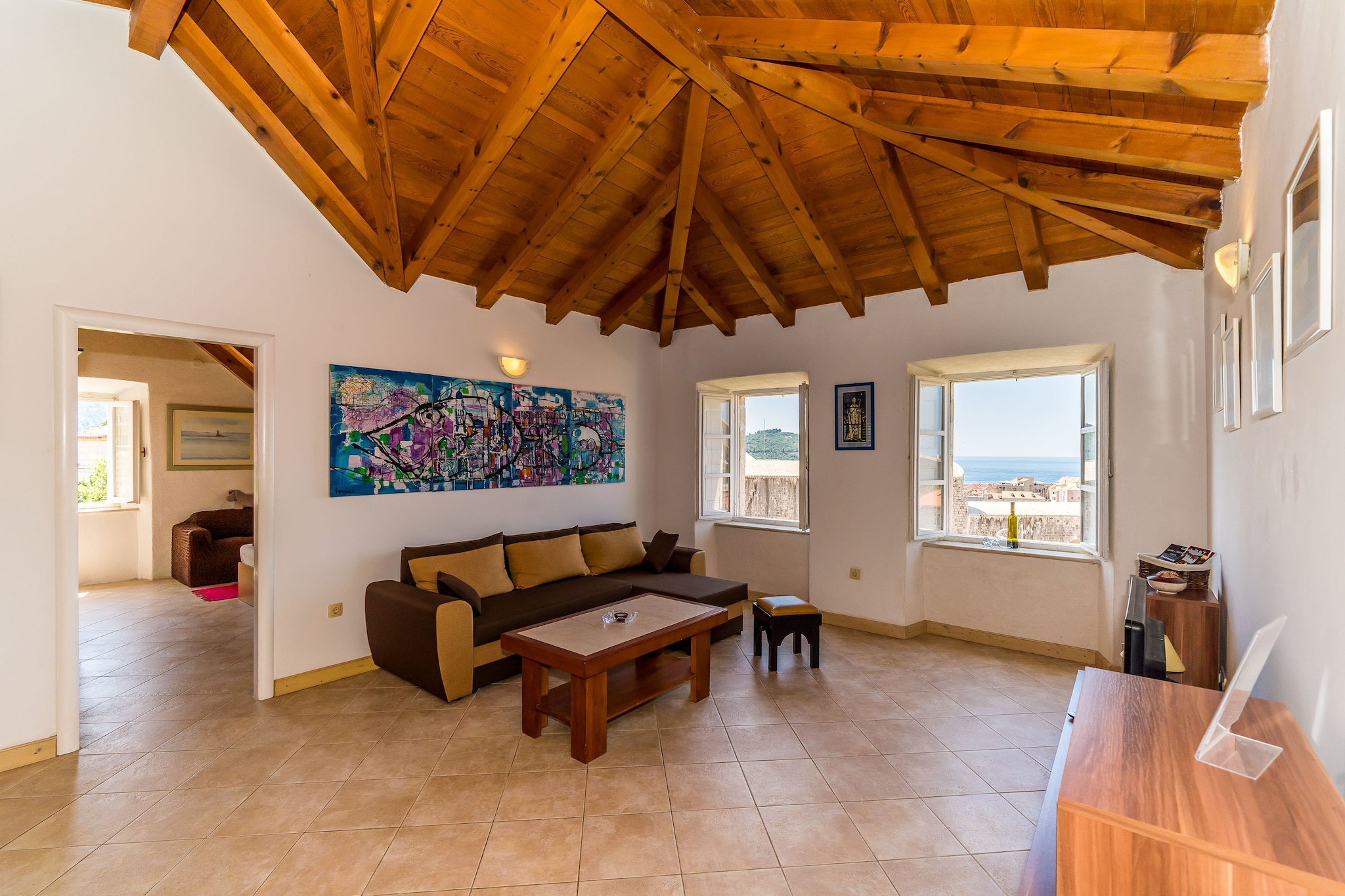 Apartment Casa Vanna offers self-catering accommodation situated in Ploče region of Dubrovnik only 350 meters from the popular Banje Beach and 100 meters from Dubrovnik’s historic center.Each unit has a dining area,  kitchen, private bathroom and a terrace overlooking the Sea . Guest will have unlimited access to WiFi.
Luggage storage is possible prior check in and after check out.

Off site public parking is available, reservation is not possible and charges are applicable.

This lovely two-bedroom apartment features free WiFi, air conditioning and flat-screen SAT TV, as well as kitchen fitted with stove, refrigerator, electric kettle, toaster, microwave and coffee machine. There are two private bathrooms fitted shower and hairdryer. Towels are provided.

Iron and ironing board will be at guests' disposal.

The UNESCO-protected center is known for its architecture where guests can explore the sights such as the Town Walls and Stradun Promenade or relax at one of the many picturesque cafes and restaurants. Accommodation is 200 meters from Old Town Port and 300 meters from Orlando Column, Rector's Palace, Franciscan Monastery, Dubrovnik Cathedral and several other attraction.  In the Old Town you will find plenty of shops, ATMs, exchange offices, bakeries and pharmacies.
The apartment is 100 meters from Dubrovnik Cable Car, and 200 meters from the bus stop on Ploče gate.

Pile Bus Stop, with frequent links to the airport and other part of the town, is within 700 meters. Dubrovnik Bus Station and Ferry Port with ferry lines to the Elaphite Islands, are 3.5 km  away, while Dubrovnik Airport is 18 km from the Apartment.