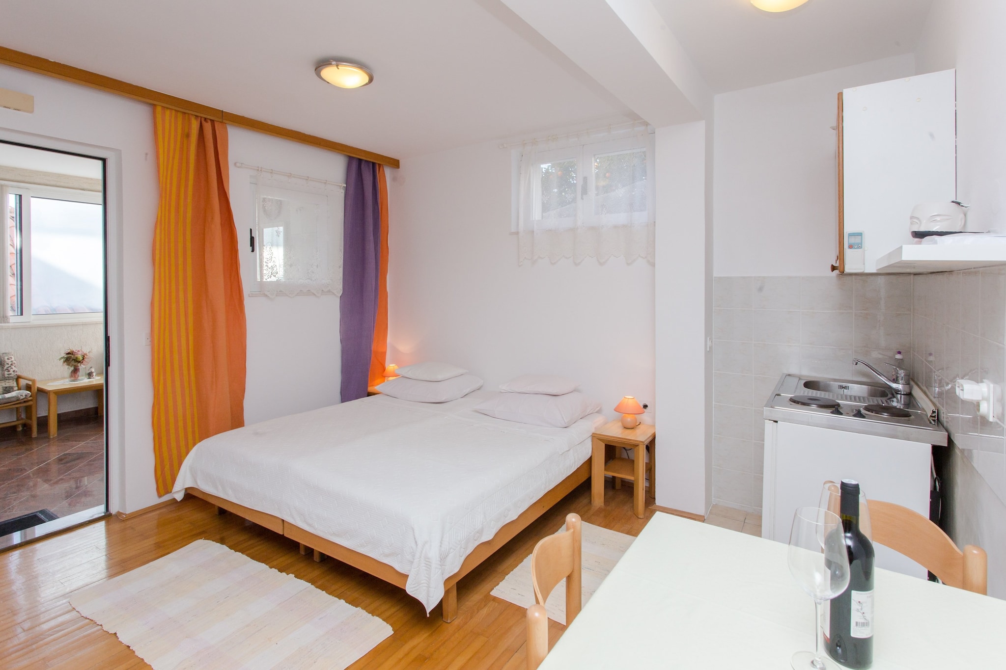 Apartment Dorina is ideally situated as it is just outside The City Walls and a stone's throw away from everything Dubrovnik has to offer, whether one is interested in historic Old City and its many sights or in basking in the Mediterranean sun and swimming in the crystal clear Adriatic sea.
Kindly note:
Luggage storage is possible prior check in and after check out.
This Studio Apartment features WiFi, air-conditioning and flat-screen SAT TV. Kitchenette is equipped with a stove, refrigerator, toaster, water kettle and kitchenware. Bathroom includes bathtub, hair dryer and washing machine.
This studio apartment can comfortably accommodate up to 2 persons.
The most interesting sights can be seen in the famous Old Town of Dubrovnik, which is located only 350 m away from the property, as well as various beaches, restaurants, cafes, bars, shops, bakeries and banks. Guests can also find a grocery store in 350 m range. The nearest beach is located 450 m away from the property.
The bus stop leading to other parts of town is just a couple hundred meters away.
Dubrovnik Main Bus Station and Ferry Port, connecting the mainland with various Dalmatian islands, are 4 km away from the apartment, while Dubrovnik Airport is 20 km away.