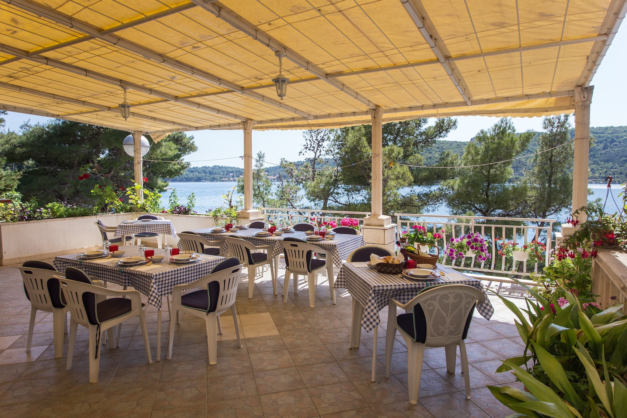 Villa Malfi is located in the Bay of Zaton, only 5 meters from the private concrete beach and 150 m from pebbly beach. 
Large furnished terrace, summer kitchen and grill are at guests disposal.
Luggage storage before check in and after check out are available, so that you can explore the area a bit more before departure.
Free private parking on site.
Cleaning fee is 25 euros per stay and it is not included in the price.

This lovely two bedroom apartment is a perfect fit for up to five persons.
It features free Wi-Fi,  air conditioning and flat screen SAT TV. It has two bedrooms and fully equipped kitchen with dining area. Apartment offers furnished balcony with sea view, Private bathroom comes with shower and hair dryer.
Shared furnished terrace with BBQ facilities and summer kitchen is at guests disposal.

The property is located in Zaton Bay, just by the sea, below the Adriatic Highway, north west from Dubrovnik’s Old Town or a 15-minute drive away.
A public bus stop near the house offers regular connections with Dubrovnik. 
Grocery shops and restaurants are within 900 m distance.

Dubrovnik main bus station and ferry port are 10 km away from the property, while Dubrovnik airport is 30 km away.
