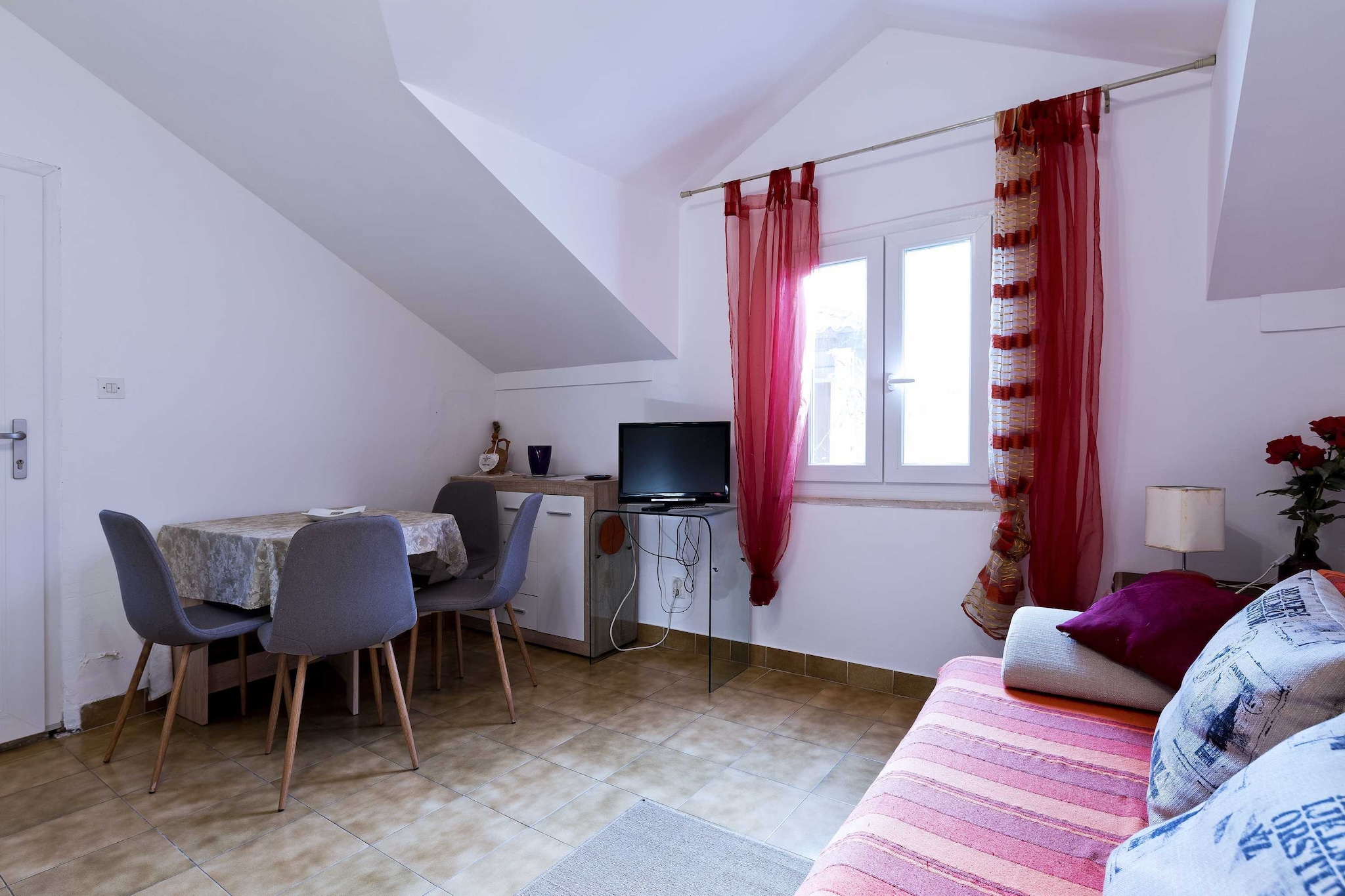 Apartment Niki is located in Ploce neighbourhood, only 3 min walk away from the Old Town.

Pets are allowed on request.

This one bedroom apartment with furnished balcony is perfectly fit for up to 3 persons. It features air conditioning, WiFi, as well as LCD TV. The open space living room comes with sofa and sitting area, and it's combined with the equipped kitchen and dining area. The apartment has a private bathroom with shower and toilet.

Iron, hair dryer, free toiletries (soap and toilet paper) as well as towels and bed linens are provided.

The apartment is located just 400 meters from the famous beach Banje, with many more of them in surrounding area and beautiful island Lokrum just a 15 minutes boat ride away. We recommend enjoying a cable car ride, station is only 3 minutes a walk from the apartment. It offers a panoramic view of the historic centre and the surrounding islands.

Famous night club Revelin, located inside the old fort, is just 350 meters away.

Dubrovnik Bus Station and Ferry Port, connecting the mainland with various Dalmatian islands are 15 minutes a ride  from the property, while Dubrovnik Airport is 19 km away.