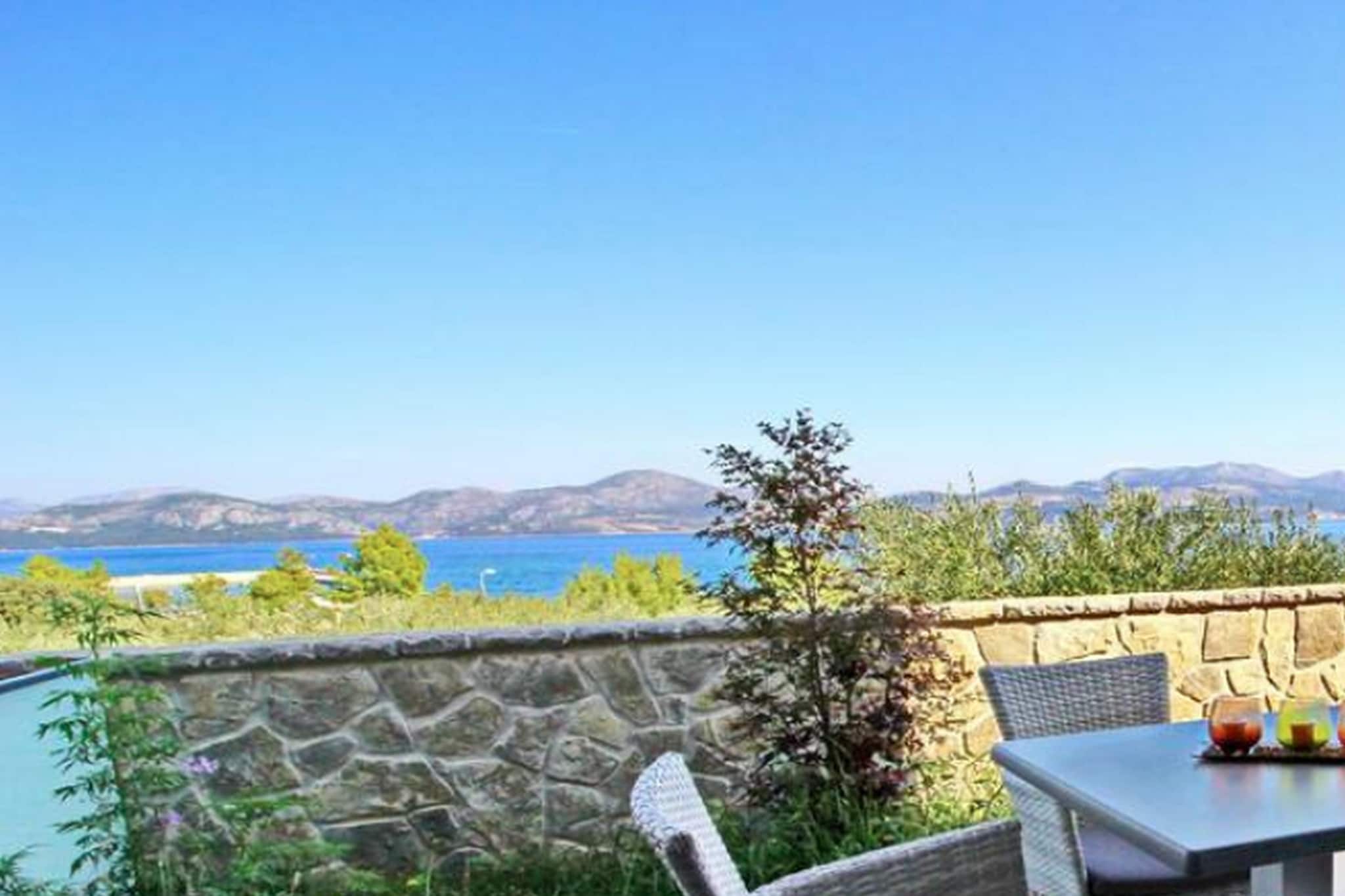 Fancy Apartments Kula in Drače, Dubrovnik-Neretva County, Croatia, offers modern, well-equipped accommodations featuring free Wi-Fi, air conditioning, and a fully equipped kitchen. Guests can enjoy in private balconies or terraces. Located in the charming coastal village of Drače, it provides easy access to local beaches, restaurants, and attractions, making it ideal for couples, families, and groups seeking a comfortable and scenic stay on the Pelješac Peninsula.

Note:

*****Please note that a city tax of €1.50 per person, per night is not included in the price and is payable directly at the accommodation. The tax is reduced by half for children aged 12-18, and there is no tax for children under 12*****

Private parking is available, reservation is not required.
Baggage drop-off is available before check-in.
Baby cot is available on request.

This lovely one-bedroom apartment with a furnished terrace is a perfect place for a relaxing vacation. Accommodation features free WiFi, air-conditioning an an SAT/flat-screen TV , equipped kitchenette with a dining area, living room and a private bathroom. This one-bedroom apartment can comfortably accommodate up to 4 persons.

Thanks to its excellent location, everything you'll need for your vacation is just a short walk away from the property. Grocery stores, cafes, restaurants—everything is within a 500 m radius. The beach is 100 m away from the property.

The nearest airport is Brac Airport, 74 km from Apartments Kula. Dubrovnik Airport is only  97 km from the property.