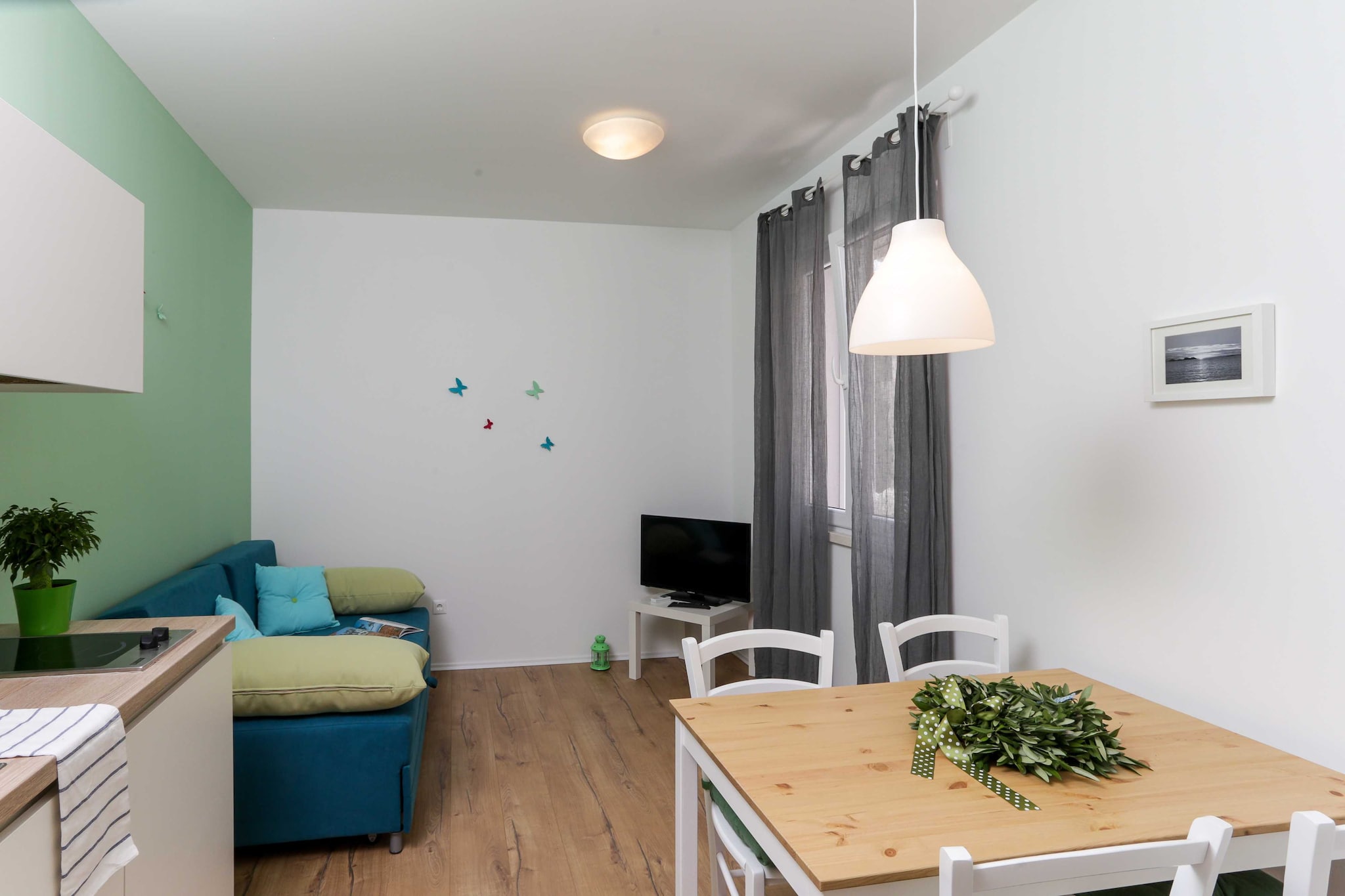 Villa Karmen is situated in a quiet neighborhood near Dubrovnik's main bus station and ferry port, connecting the mainland with various Dalmatian islands. 
Accommodation's location is perfect for getting  to know undiscovered areas of Dubrovnik and visiting Dubrovnik's breathtaking archipelago. 
Private parking is free of charge is available on site, reservation is not needed.
The property owner can help with organizing different day trips upon request.

This lovely one bedroom apartment features free WiFi, air conditioning, living room with cable TV and kitchen with dining area. 
Private bathroom comes with shower and hair dryer. It will also provide you with a lovely furnished terrace.

Villa Karmen is ideally situated as it is only 12 minutes walk away from the historic Old City of Dubrovnik and just up the street from the modern center of Dubrovnik.
Grocery store, bus station, restaurants, bars and cafes can be found within walking distance, as well as bakeries and ATM's.

Dubrovnik bus station and ferry port, connecting the mainland with various Dalmatian islands, are 10 minutes from the apartment, while Dubrovnik Airport is 21 km away.