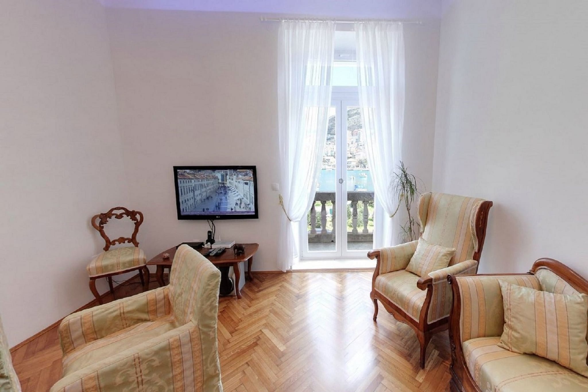 Apartment Mihe is self catering accommodation located in Batala, Dubrovnik.
Free WiFi and air conditioning are provided.
Luggage storage is available before check in and after check out.
Apartment Mihe with balcony and sea view is a perfect fit for up to six guess.
Free WiFi and air conditioning are provided.
Living room features flat screen cable TV and seating area. Kitchen is fully equipped with oven, stove, refrigerator, kettle, microwave, coffee maker, dishwasher, toaster and dining area. Apartment features bathroom with shower and bathroom with spa bath. Both bathroom features toilet, soap and toilet paper. Hair dryer, washing machine and dryer are provided.
The part of the town, where this apartment is located, is quite popular because everything you may need is near the accommodation and guests can reach Old Town in less then 10 minutes drive or 35 minutes walk. Grocery store, bus station, restaurants, bars and cafes can be found in 300 meters range, as well as bakeries and ATMs.
The nearest beach is 15 minutes walk from the apartment.
Dubrovnik bus station and ferry port, connecting the mainland with various Dalmatian islands, are 5 minutes ride from the apartment, while Dubrovnik Airport is 21 km away.