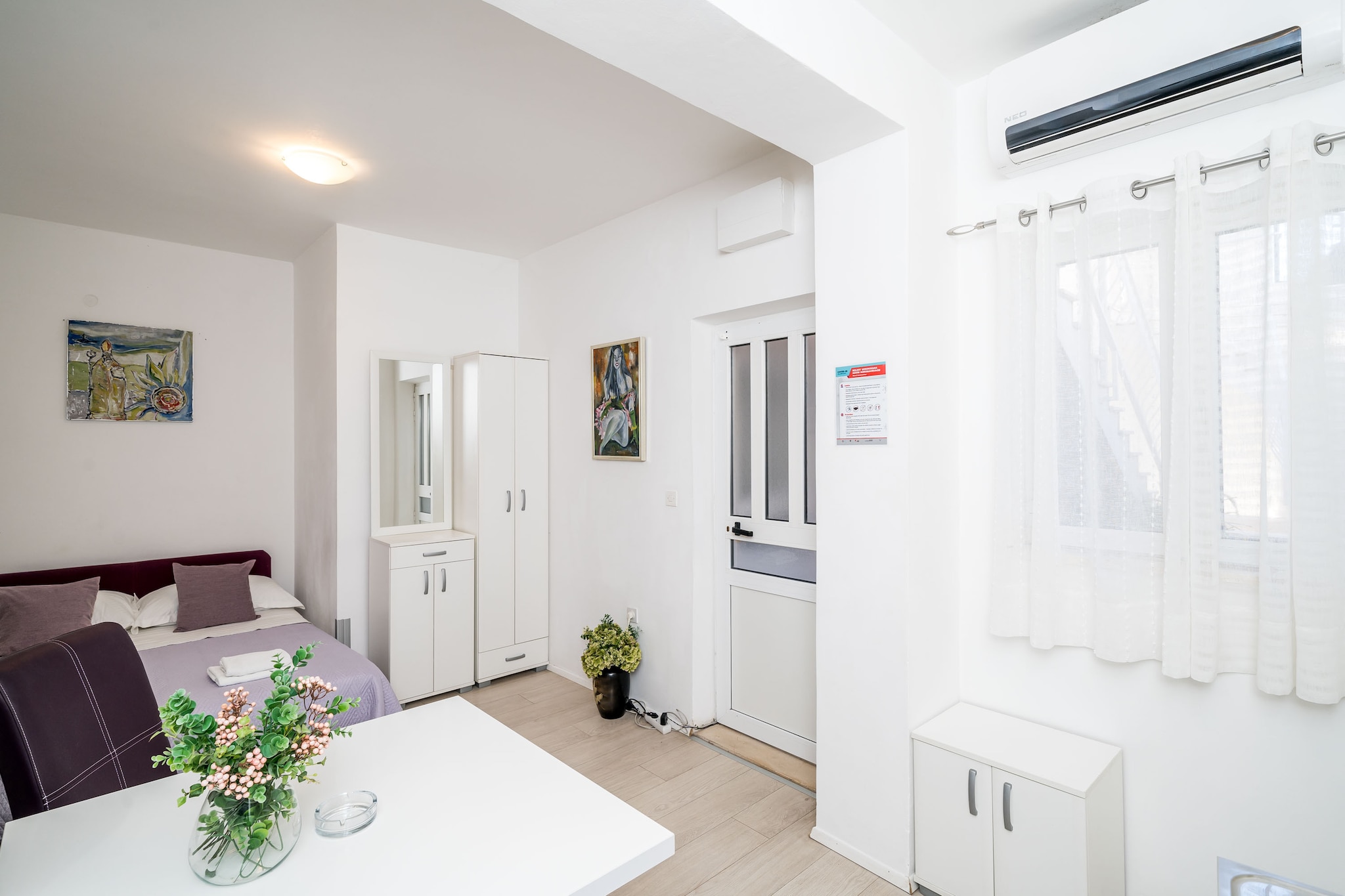 Apartments Isabora feature self-catering accommodation located just 270 m from the Old Town. All units are equipped with WiFi, air conditioning, and cable TV. Guests will have access to a shared roofed terrace that offers a beautiful sea view and historic Old Town view. Airport shuttle is available upon request, charges do apply.

This modern Studio Apartment comfortably fits two people and it features air-conditioning, WiFi and flat-screen TV.  Kitchen is well equipped with a stove, refrigerator, toaster, water kettle and coffee machine. Bathroom includes a bathtub.

Apartments Isabora are just 250 meters away  from the Old Town (historic center) and the nearest beach is 400 m away from the property. Open-air green market and other shops, as well as a bakery, banks and ATMs, cafes, bars and restaurants with local and other cuisine can be found inside the Old Town. The grocery shop, bakery and cafes can be found in 200 meters range.  Famous Banje beach is 450 m from the accommodation. The nearest bus station is 300 meters away, with buses passing frequently. We recommend enjoying a cable car ride, station is only 300 meters ( 5 minutes walk) from the apartment.

Dubrovnik Bus Station and Ferry Port, connecting the mainland with various Dalmatian islands are 3,5 km away from the property, while Dubrovnik Airport is 19 km away.