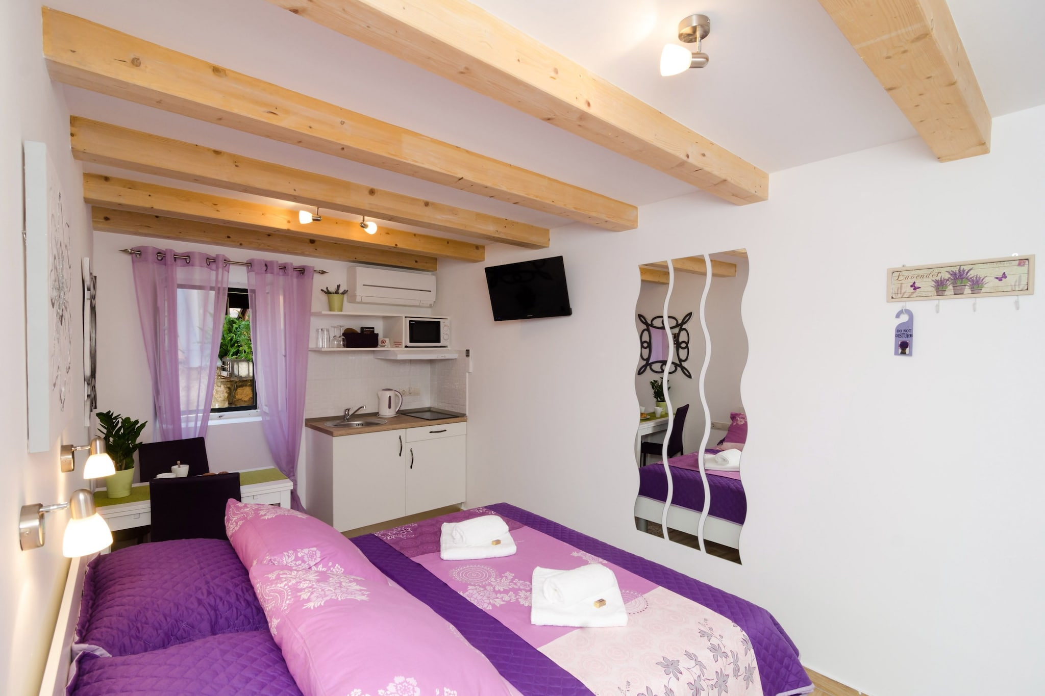 Lavender Garden Apartments are self catering accommodation situated inside the city walls of Dubrovnik.
Property features 5 accommodation units.
Baby cot is provided.
This studio apartment is located on the upper floor and features free WiFi, air conditioning and Android/Smart TV. Kitchenette features with refrigerator, kettle, microwave, stove, toaster and dining area. Private bathroom comes with shower, hair dryer, toilet paper and soap. Linen and towels are provided, so as ironing facilities and first aid kit.
Lavender Garden Apartments are situated inside the city walls, in heart of Dubrovnik Old Town. Being nestled right in the heart of Dubrovnik, this location is perfect for seeing local attractions such as Old Town Port, Church of St. Blaise, Rectors Palace, Dubrovnik Cathedral, Franciscan Monastery and Orlando's Column. The nearest beach is located 200 m away from the property. There is an open-air green market and other shops within walking distance, as well as a bakery, banks and ATM's, cafes, bars and restaurants with local and other cuisine. The nearest restaurant is located 300 m away from the property. Market can be found at 350 m distance, while supermarket is located 2 km away. Night club Revelin, located inside the old fort, is 600 meters away.
Dubrovnik Bus Station and the Ferry Port with links to nearby islands are 4 km away, while Dubrovnik Airport is 22 km from the property.