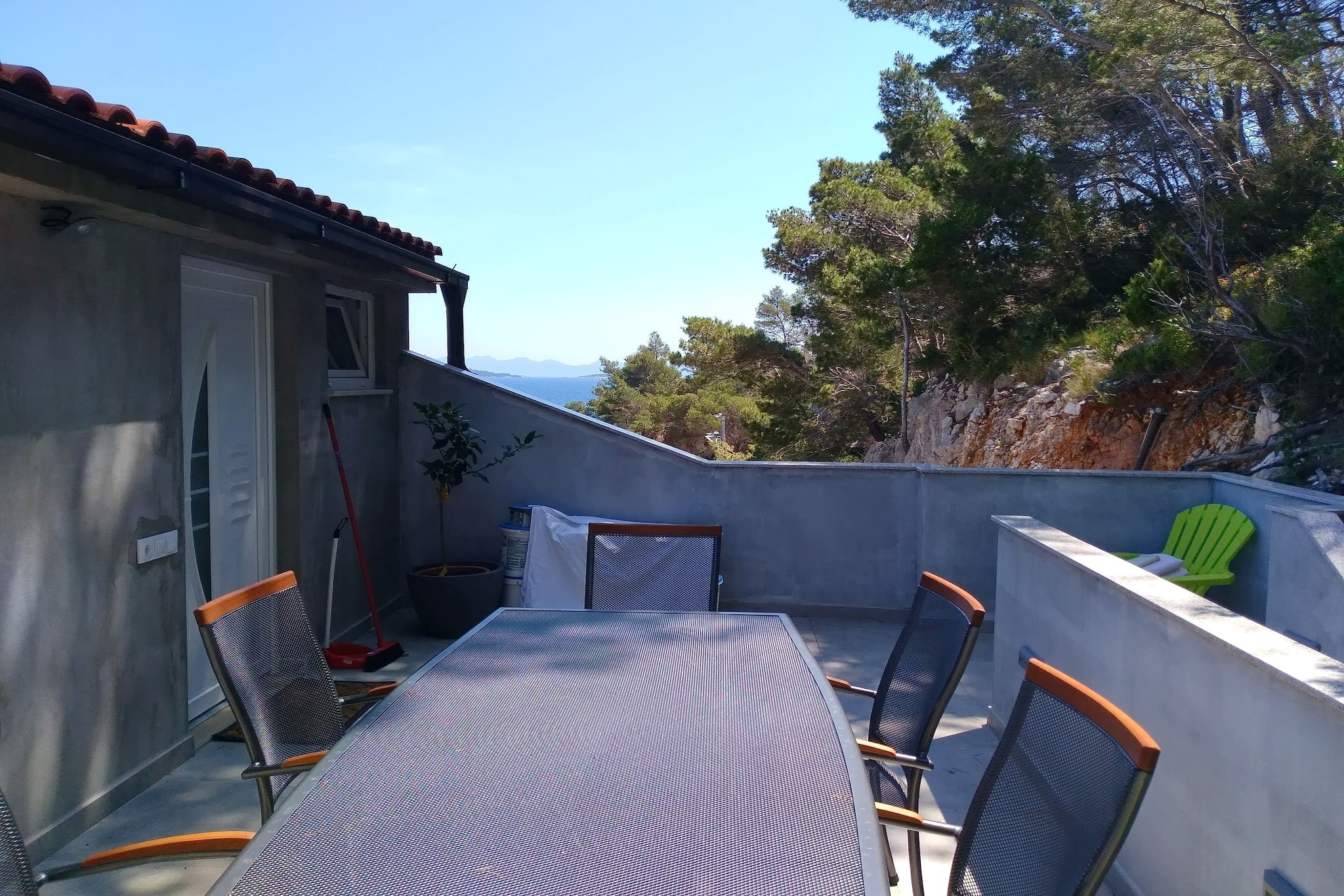 Apartments Bezek are located in charming little village Trstenik on peninsula Pelješac.

Luggage storage before check in is available.

Free private parking on site.

This lovely standard two bedroom apartment is a perfect fit for up to five persons. It features free WiFi, air-conditioning and cable  TV. Well equipped kitchen comes with combined dining area  and living room. It will also provide you with a lovely furnished terrace with a sea view. 
Washing machine and hairdryer are also at guests disposal.

Trstenik is a village situated on the southern coast of the Peljesac peninsula. It is connected to the Croatian mainland by the coastal road via Ston. The village is located in a deep, south facing bay under the tall Peljesac hills, with a large pebble beach at the base of the bay.

A restaurant, grocery shop and a small green market are within only 150 m from the Bezek Apartments.

The local night club can be reached in a 10-minute walk.

Town of Orebić, providing ferry connections to Korčula Island, is 26km away. The historic town of Ston with the impressive Walls of Ston is at a distance of 35 km. Dubrovnik airport is 107 km away.