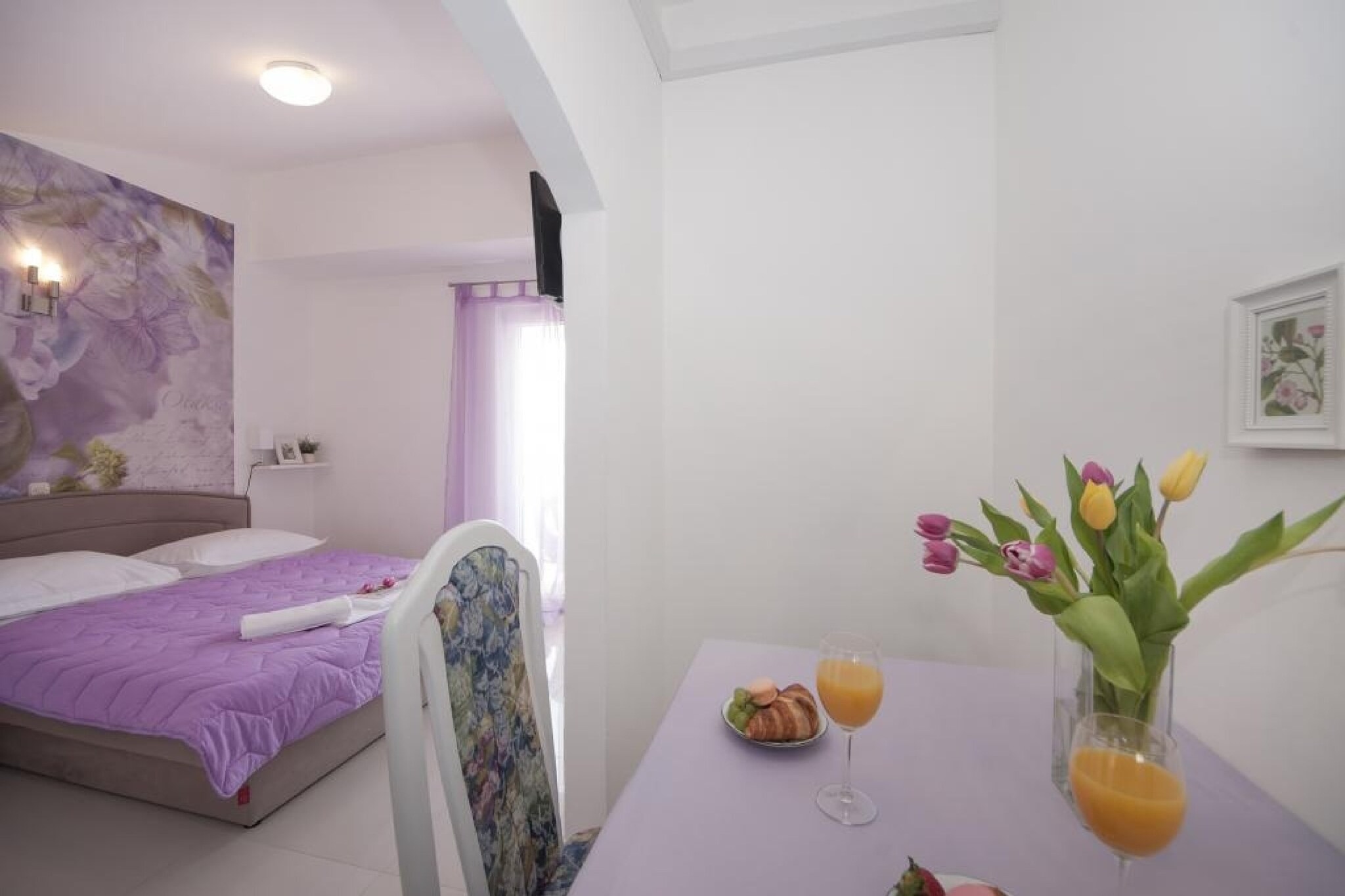 Apartments Villa Angela are located in Baška Voda. It offers one bedroom apartment, two studio apartments and two bedroom apartment. All apartments includes air-conditioning, free WiFi, balcony, common BBQ .
Free private parking is on disposal to the guests, reservation is needed

Luggage storage is available before and after check in, so you can explore the city little bit more on your departure.

Studio apartment can accommodate two guests. This studio has a one king size bed and a one person sofa. It offers free WiFi, free private parking and is air conditioned. The living room is fitted with a flat screen SAT TV and a safe deposit box. The kitchenette offers a refrigerator, stove and a water kettle. The private bathroom has a shower and a hair dryer at your disposal. Guest has access to common BBQ facilities.

Apartments Villa Angela are located in Baška Voda. This location is perfect for guests who love to enjoy the sun and the sea, want to  avoid the crowds, enjoy the peace and keep the privacy. 
Beach, restaurant and tourist info are 150 meters away from the property. Market is 30 meters away. The nearest bus stop is 10 meters away from the property.The gas station and ferry bar are located 8 km from the Apartments Villa Angela.  Post office and bank can be reached within 200 meters. Ambulance is 10 meters while pharmacy is 100 meters.

Split Airport is 91 km away from the property