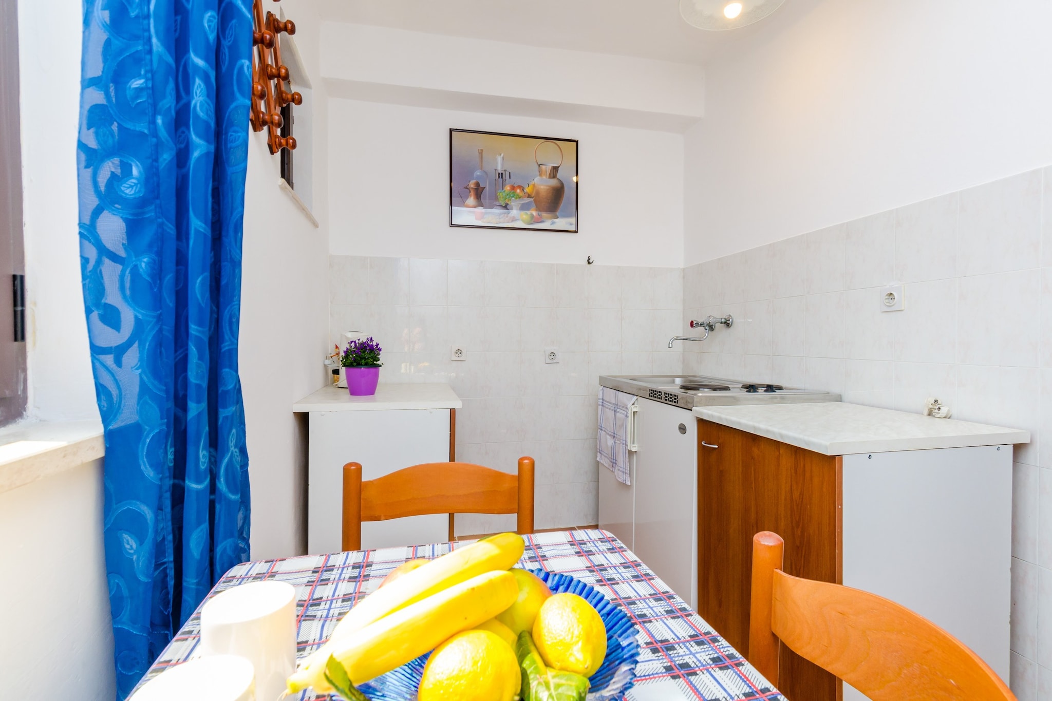 On the 1st floor: (Kitchen, Living/bed room(2x single bed), bathroom)\n\nTV, stove, electric kettle, coffee machine, fridge, shower, balcony, air conditioning, parking, ironing board, iron, hairdryer
