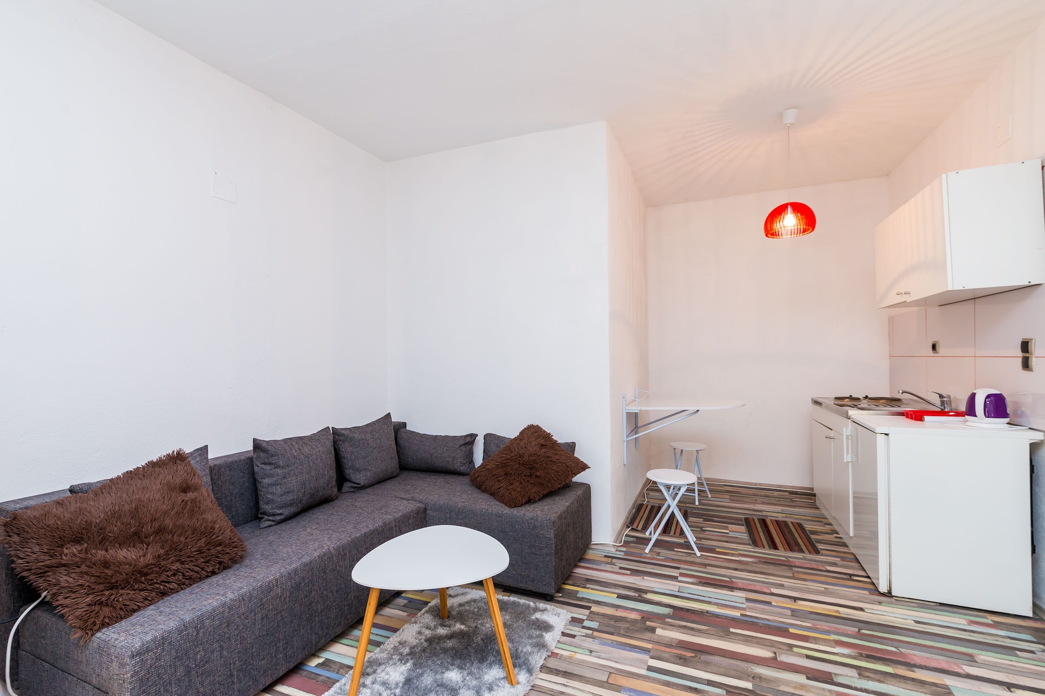 On the 1st floor: (Living room(TV), Kitchenette(stove, electric kettle, fridge), Living/bed room(2x single bed), bathroom(shower), toilet)\n\nair conditioning, parking
