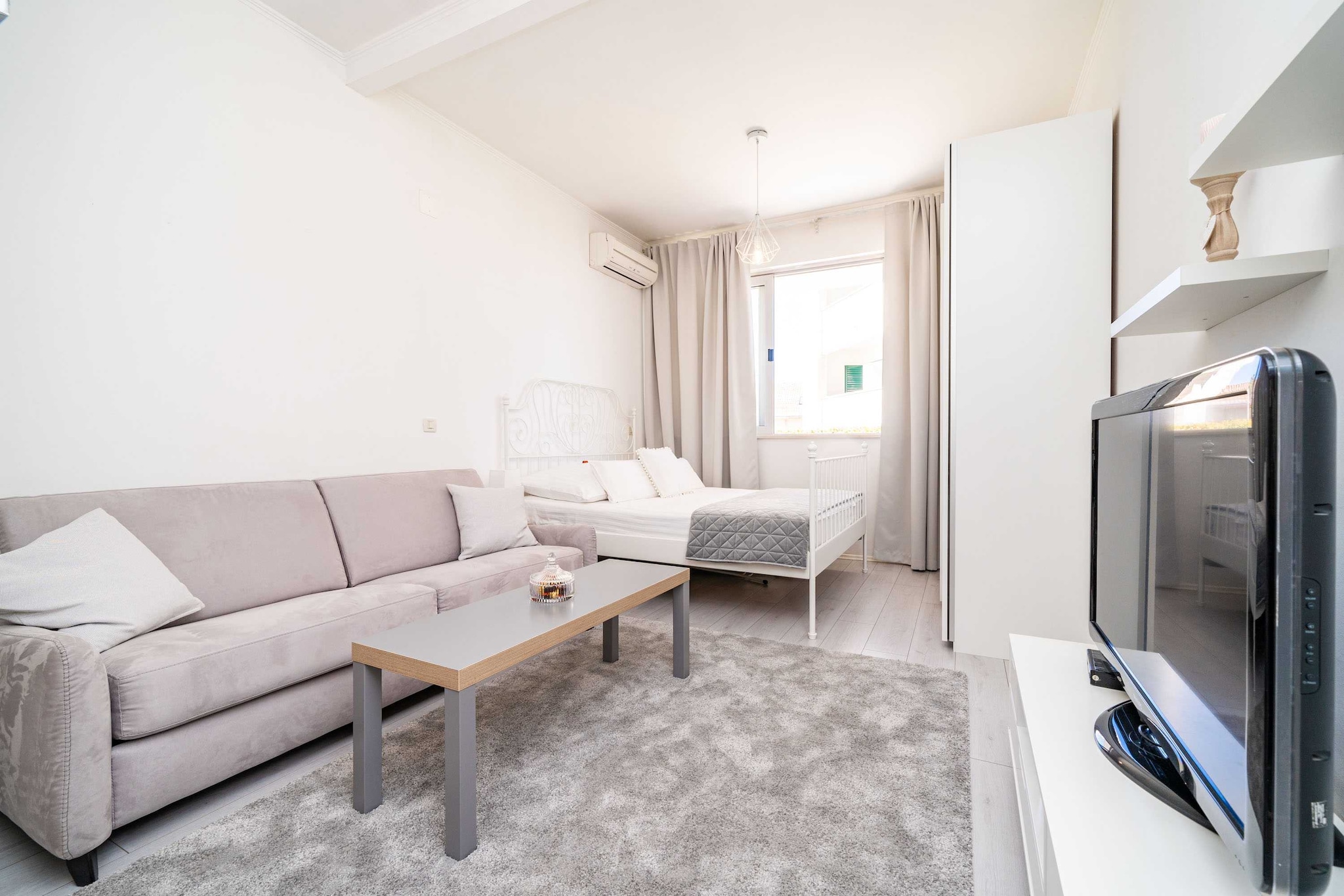 Apartment Larissa is located approximately 700 meters from Dubrovnik main bus station and ferry port.
This studio apartment can comfortably accommodate up to three persons.
It features free WiFi, air-conditioning and cable TV. Fully equipped kitchen comes with dining area for three, one double bed and a convertible sofa.
Private bathroom comes with shower. It will also provide you with a lovely furnished terrace with partial sea view.
Ironing facilities and baby cot are also on guests disposal.
Grocery store, green market, restaurants, cafes, bakeries and ATMs can be reached by foot in 10 minutes. It is 6 km from Lapad Bay with its beautiful beaches.
The famous Old Town of Dubrovnik is 4,5 km away, with various beaches, historic sights, restaurants, cafes, bars and shops. The nearest bus station is 50 meters from the apartment, with buses passing frequently and less that 12 minute ride to the Old Town, or 40 minute walk.
The nearest airport is in ÄŒilipi 21,5 km from the apartment.